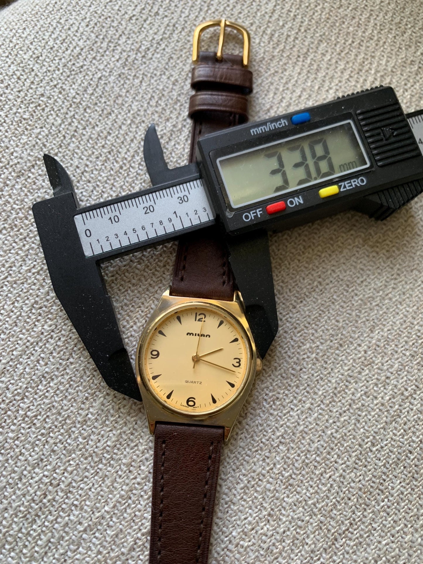 1990s Milan Quartz Watch. Super Shiny Gold tone. Retro Vintage. New Leather Band, Gold Dial. Great Retro Modernist Design, New Battery.
