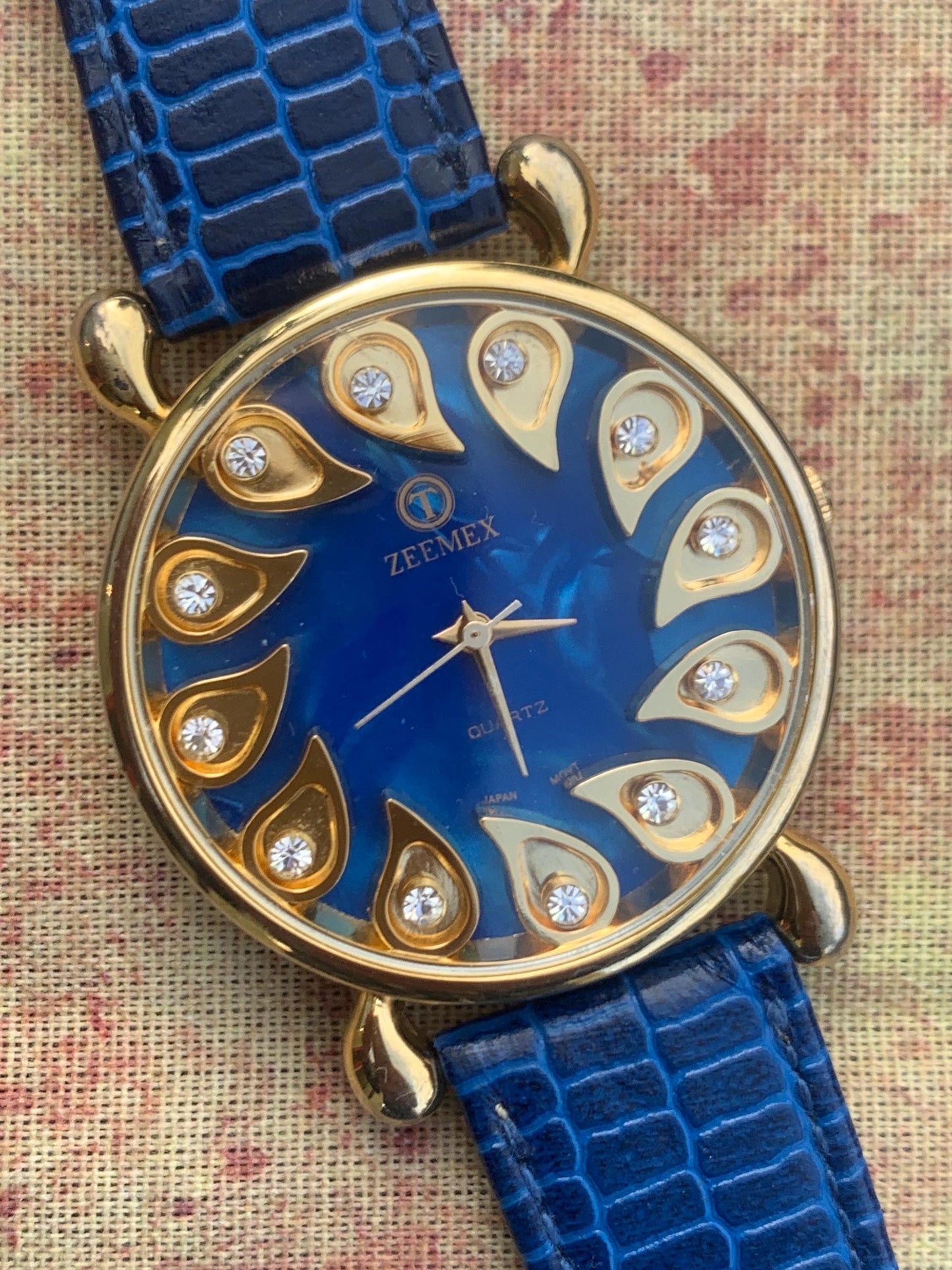 Luminescent Blue 1990s Quartz Watch - 37mm, Gold Indices with Floating Jewels on Ultra Radiant Blue Dial. New battery & NOS blue strap. Fun!