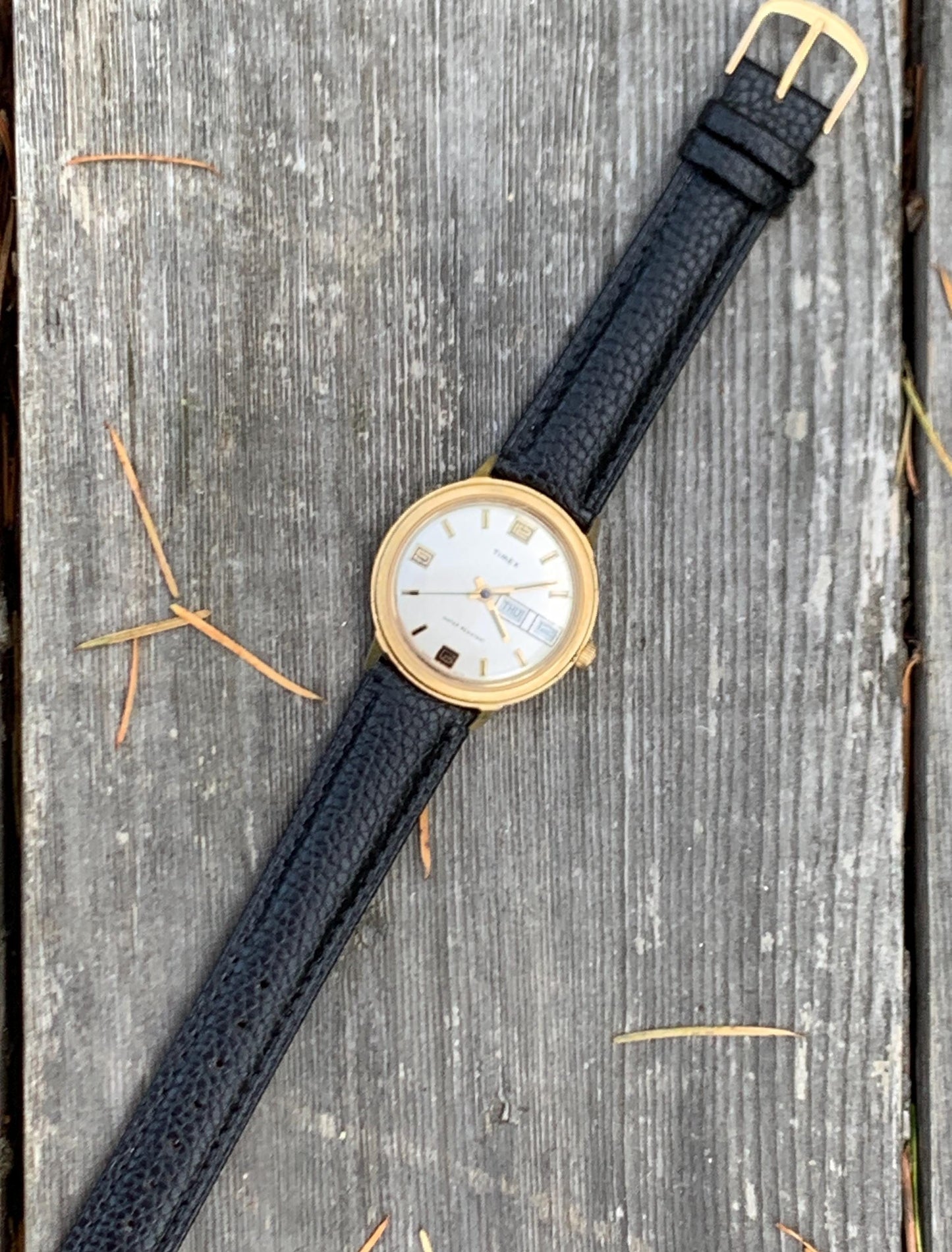 1976 Timex Marlin Winder Watch, Goldtone Case w/Champagne Calendar Dial and Mod Digits Decent Overall Condition w/New Leather Band. Works!