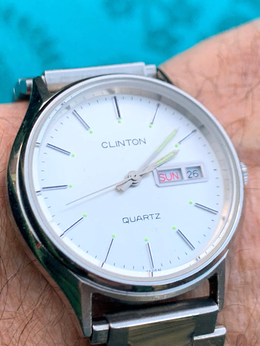 Unusual Rare 1970s Clinton Quartz Watch - Original High Polish Stainless Steel Calendar from Clinton Watch Co. Silver Dial, New Battery.
