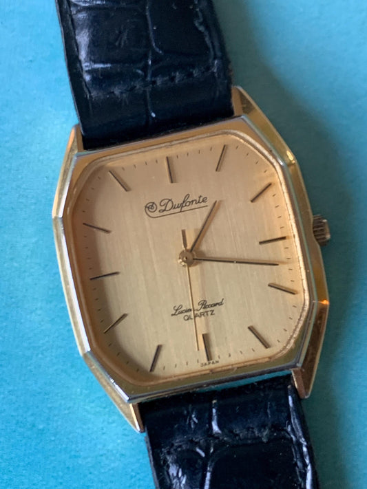 Elegant Dufonte by Lucien Piccard Tank Watch: Goldtone Quartz with Brushed Golden Dial. 1980s/90s Fancy Dress Watch, NOS vintage black strap