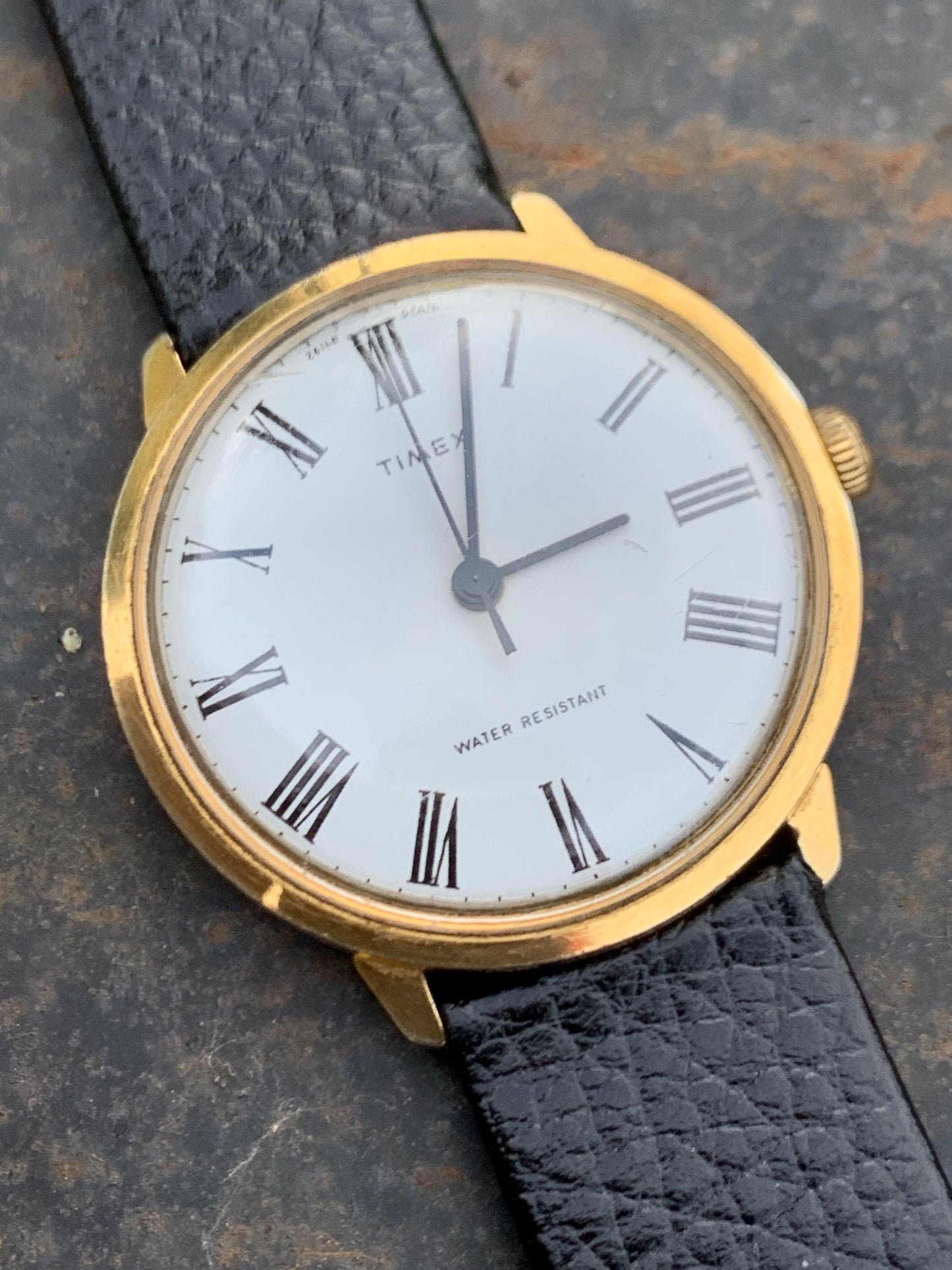 Classic 1976 Timex Marlin Roman Winder Watch. White Dial with Roman Numeral Indices. Good Condition Mechanical Winder, works. New Leather.