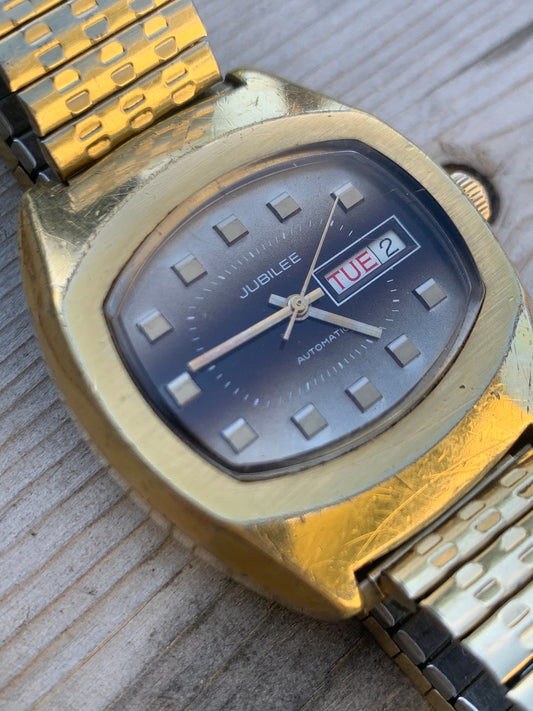 1970s Jublilee Automatic TV Style Watch with Day/Date. Fifty years of loving wear showing here and there. Great crystal, works, keeps time.
