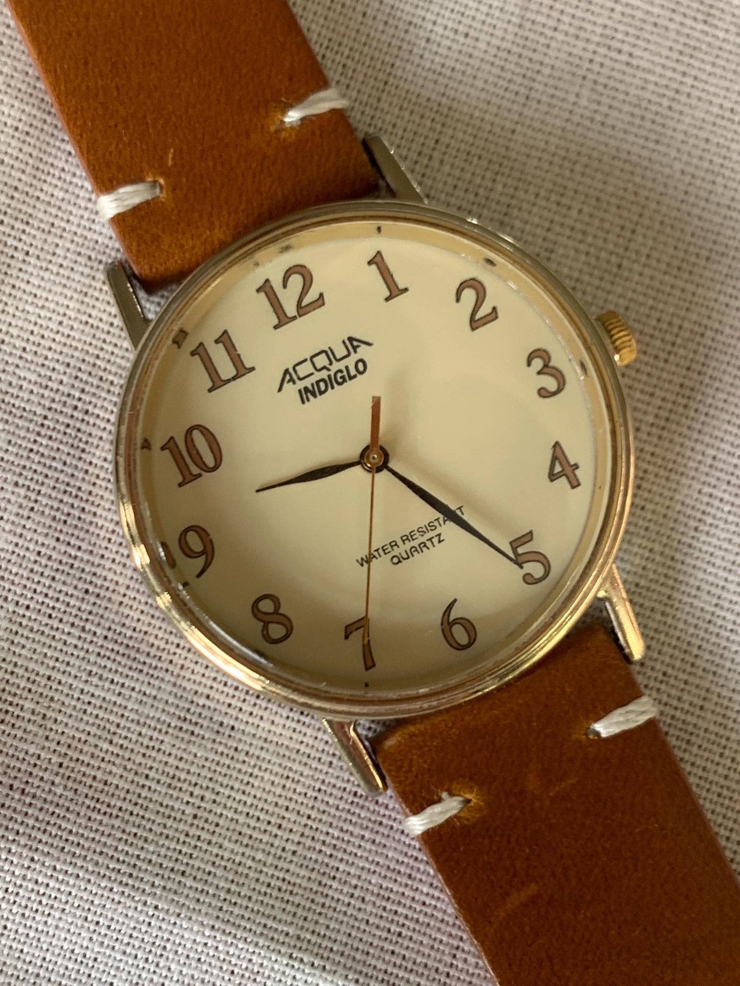 Creamy Retro 34.5mm Acqua by Timex Indiglo Quartz Watch. Goldtone. Y2K Survivor w/New Battery, New Classic Retro Light Brown Leather Strap.