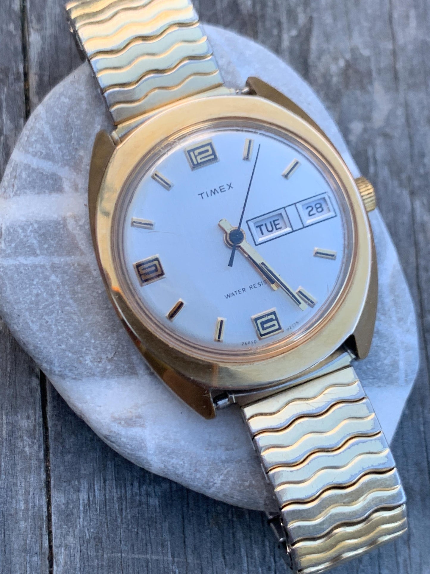 1975 Timex Marlin Winder Watch, Goldtone Case w/Champagne Calendar Dial. Decent Overall Condition with Period Expanding Band. Works!