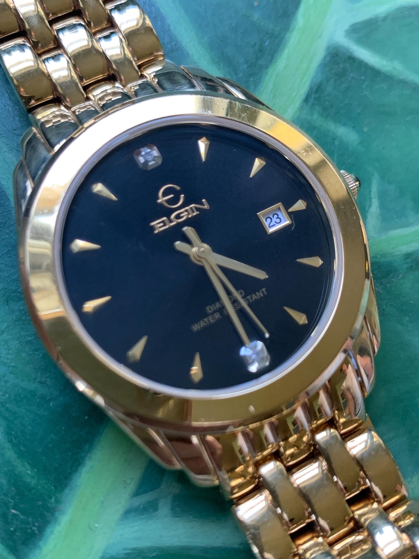 Elegant Elgin Diamond Dial Quartz Watch.  Gold Tone w black dial. Date. Classic 'Fancy' Retro Style. Bracelet. New battery. Great condition.