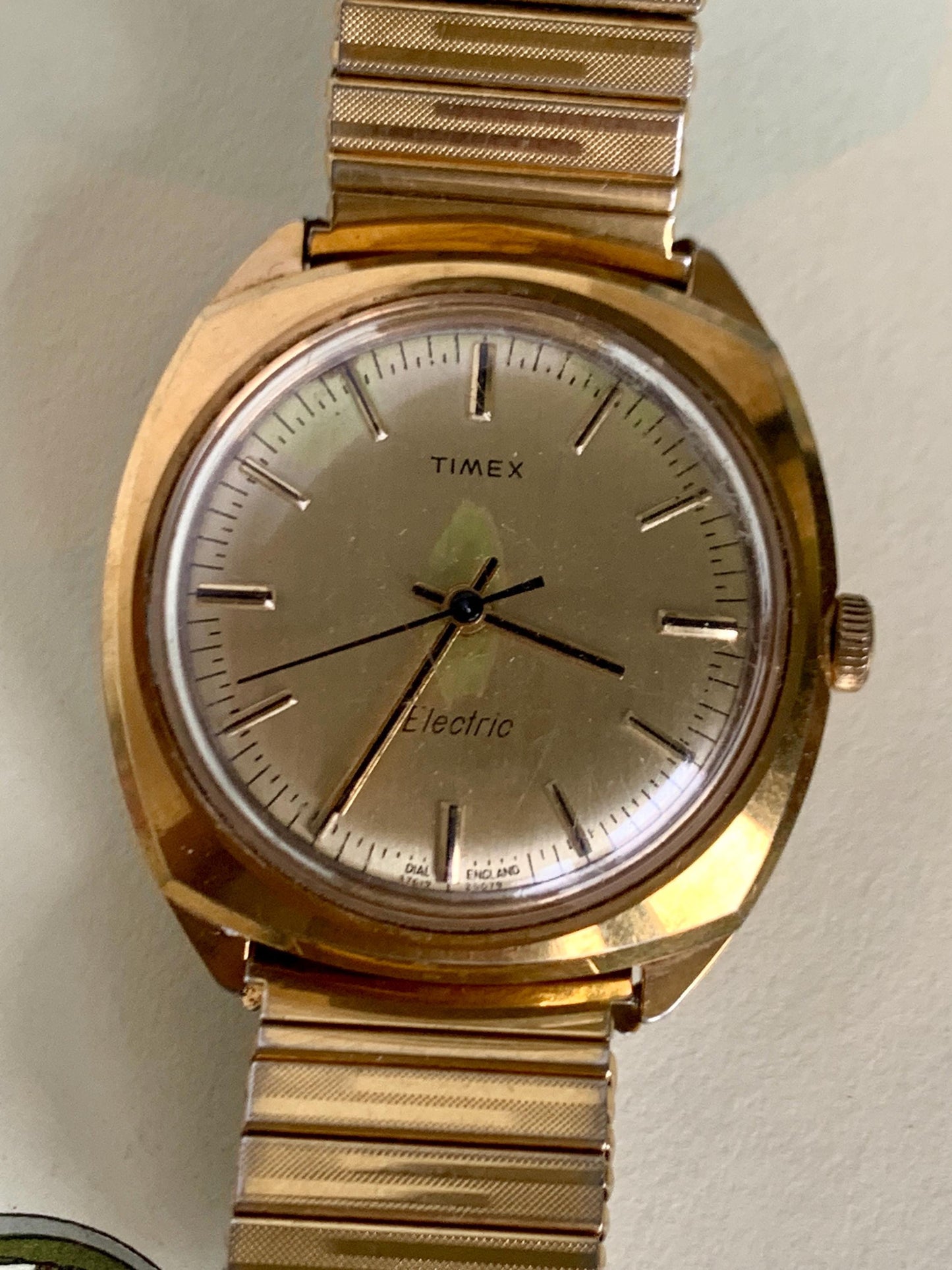 1979 England Dial Timex Electric Watch, Square-ish Goldtone Case w/Golden Dial. Decent Overall Condition with Period Expanding Band. Works!