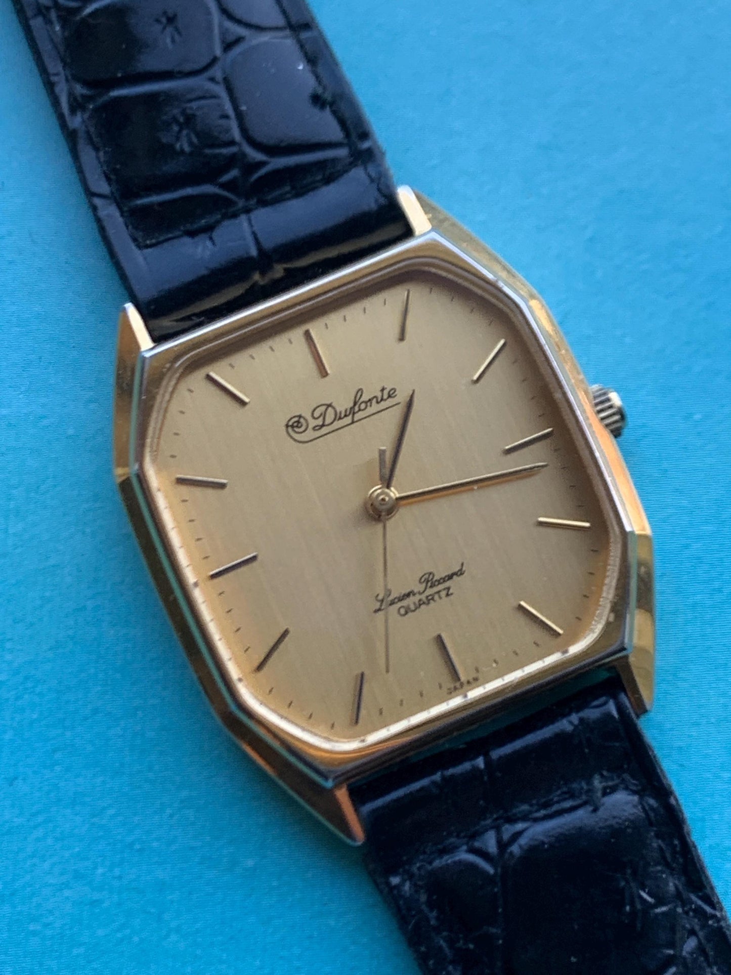 Elegant Dufonte by Lucien Piccard Tank Watch: Goldtone Quartz with Brushed Golden Dial. 1980s/90s Fancy Dress Watch, NOS vintage black strap