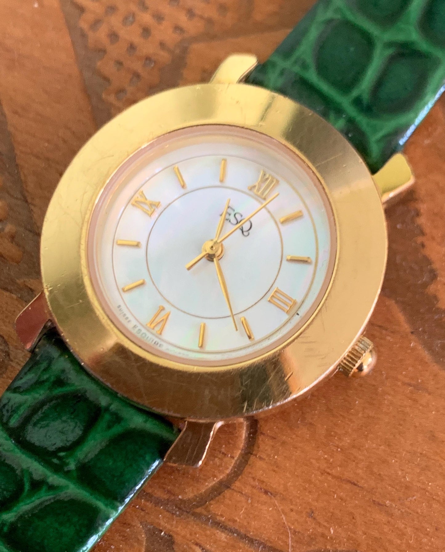 Modernist ESQ (by Movado) Roman Mother of Pearl Dial, Gold Tone Fancy Lugs, 90s, New Crocodile Pattern Green Band. 28mm. Swiss ETA Movement.
