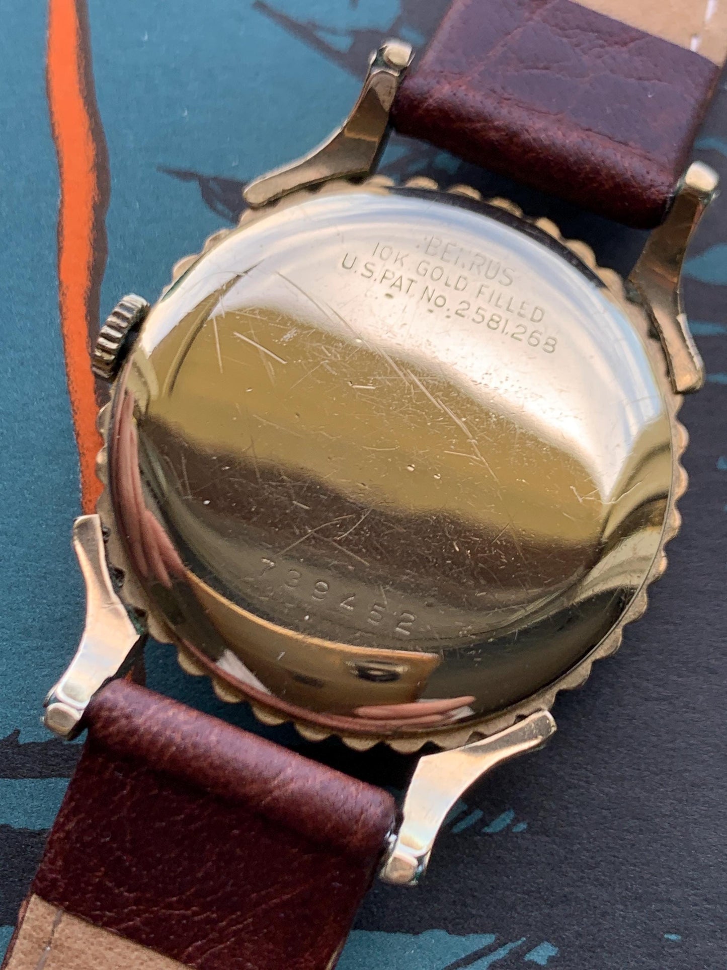 Rare 1950s Benrus Elegance 10K Gold-Filled "Bottlecap" Watch. 17 Jewels, in Excellent Condition. Fancy Horned Lugs and Sub-Second Hand.