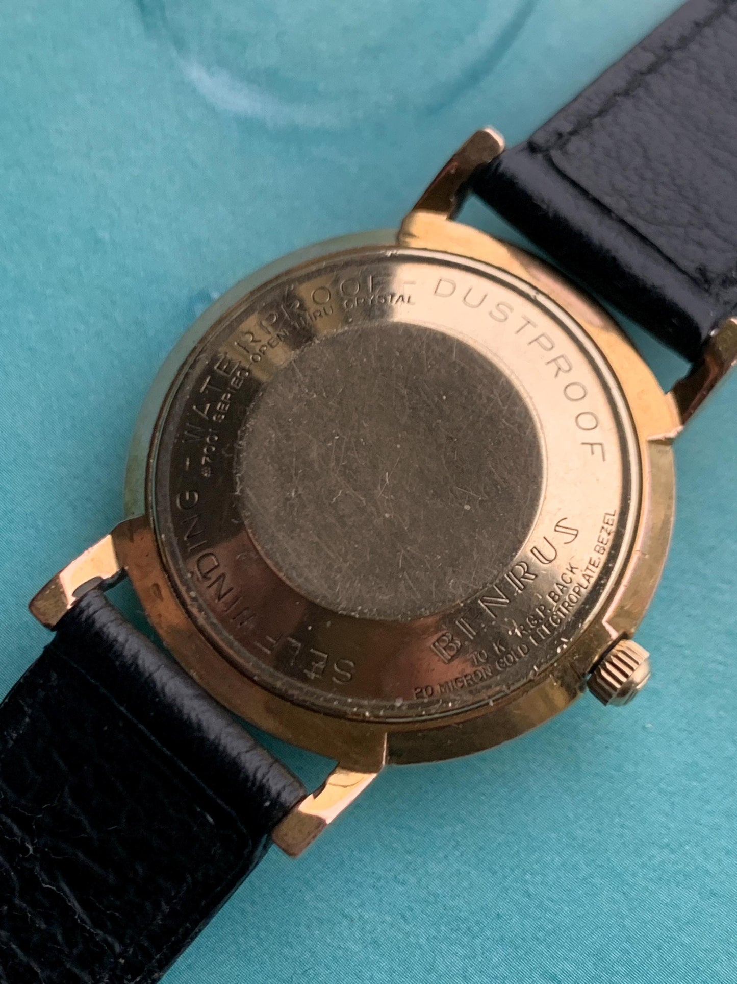 Late 1950s Benrus 7001 Citation Automatic. 10K Gold Plated in good working condition. Stick Indices Ribbed Dial. Self-winder w/vintage strap