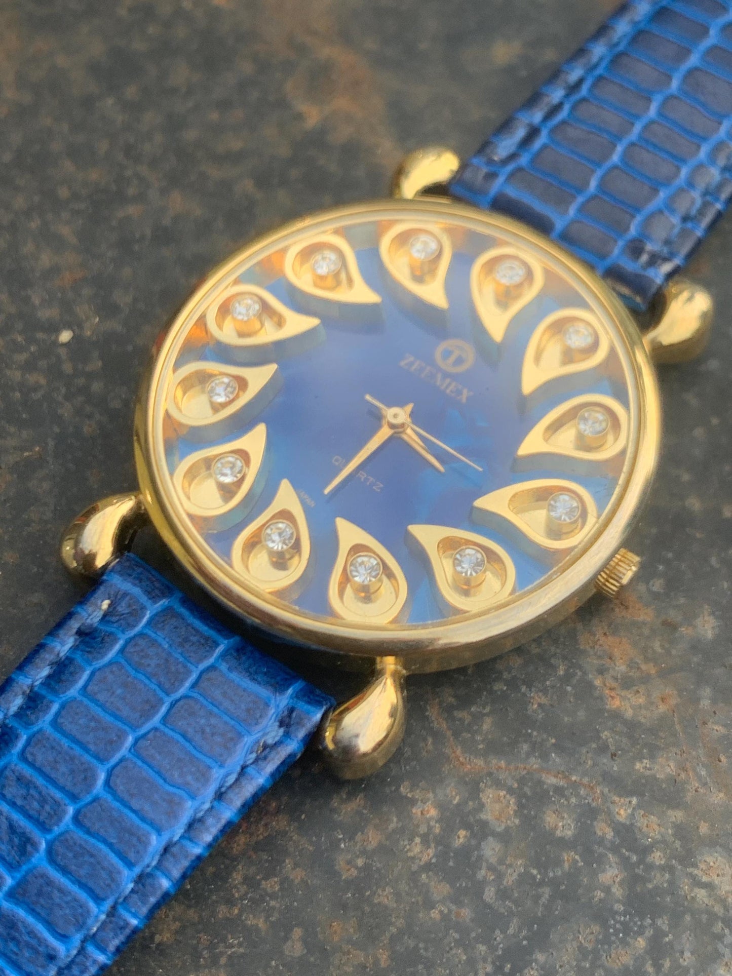 Luminescent Blue 1990s Quartz Watch - 37mm, Gold Indices with Floating Jewels on Ultra Radiant Blue Dial. New battery & NOS blue strap. Fun!