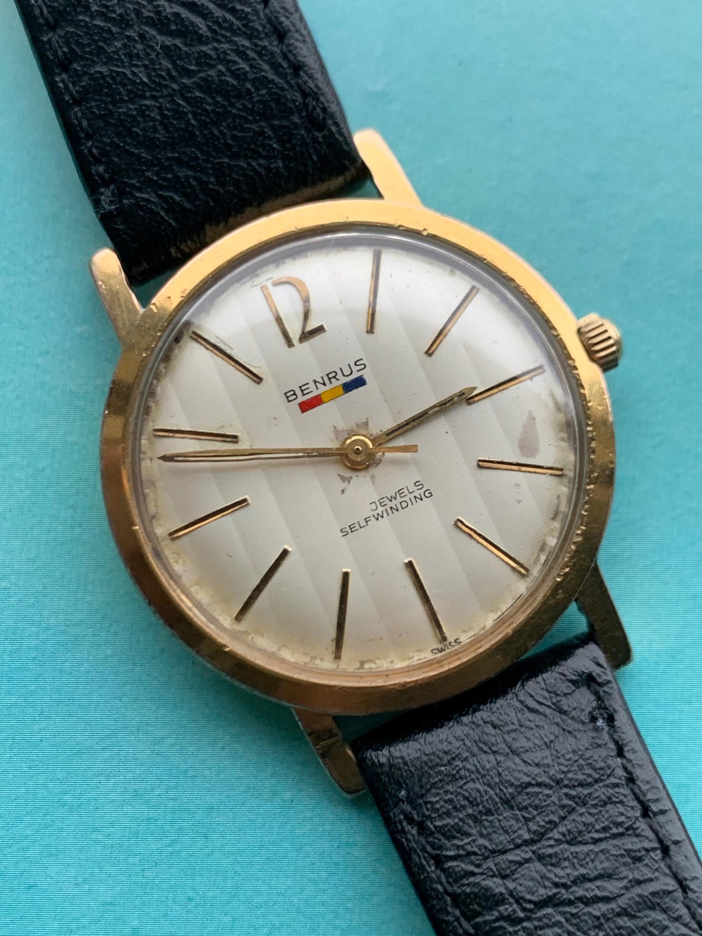 Late 1950s Benrus 7001 Citation Automatic. 10K Gold Plated in good working condition. Stick Indices Ribbed Dial. Self-winder w/vintage strap