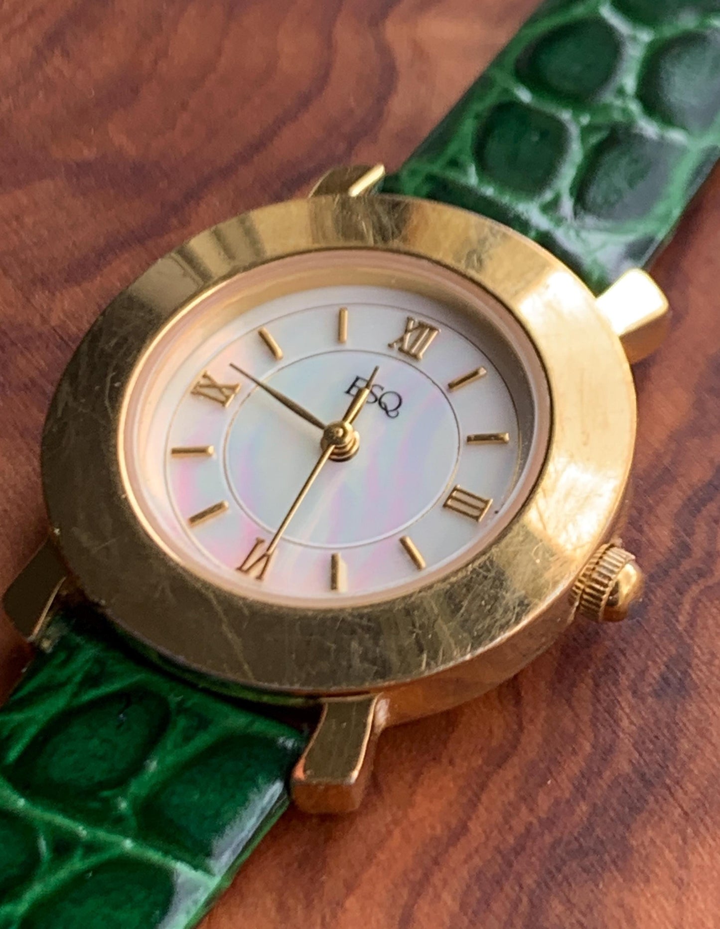 Modernist ESQ (by Movado) Roman Mother of Pearl Dial, Gold Tone Fancy Lugs, 90s, New Crocodile Pattern Green Band. 28mm. Swiss ETA Movement.