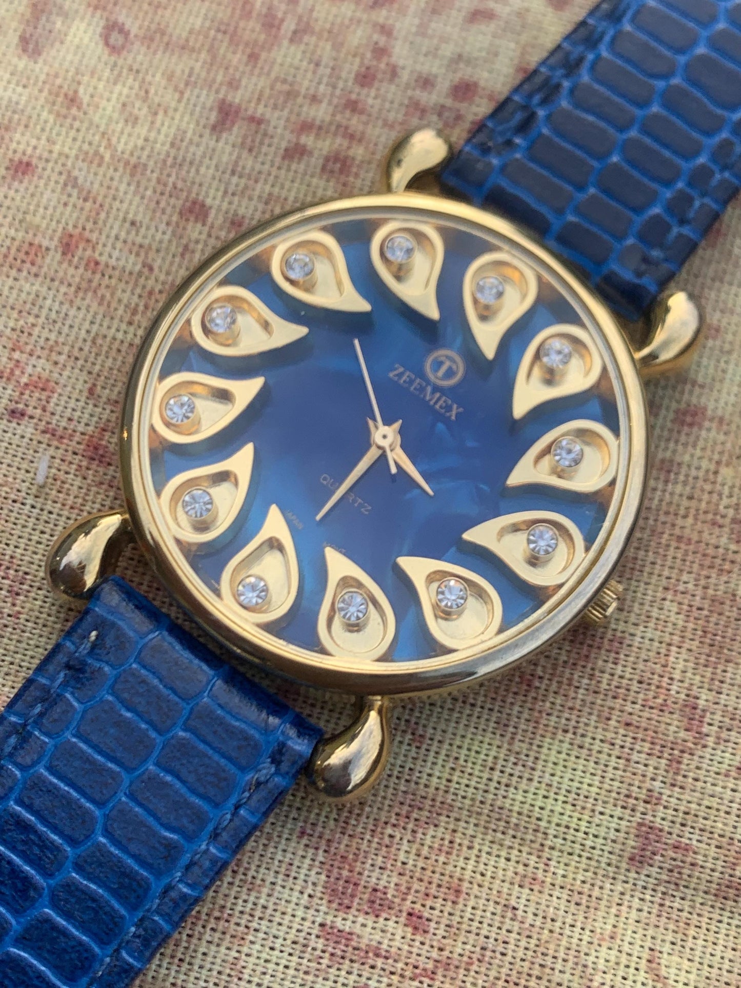 Luminescent Blue 1990s Quartz Watch - 37mm, Gold Indices with Floating Jewels on Ultra Radiant Blue Dial. New battery & NOS blue strap. Fun!