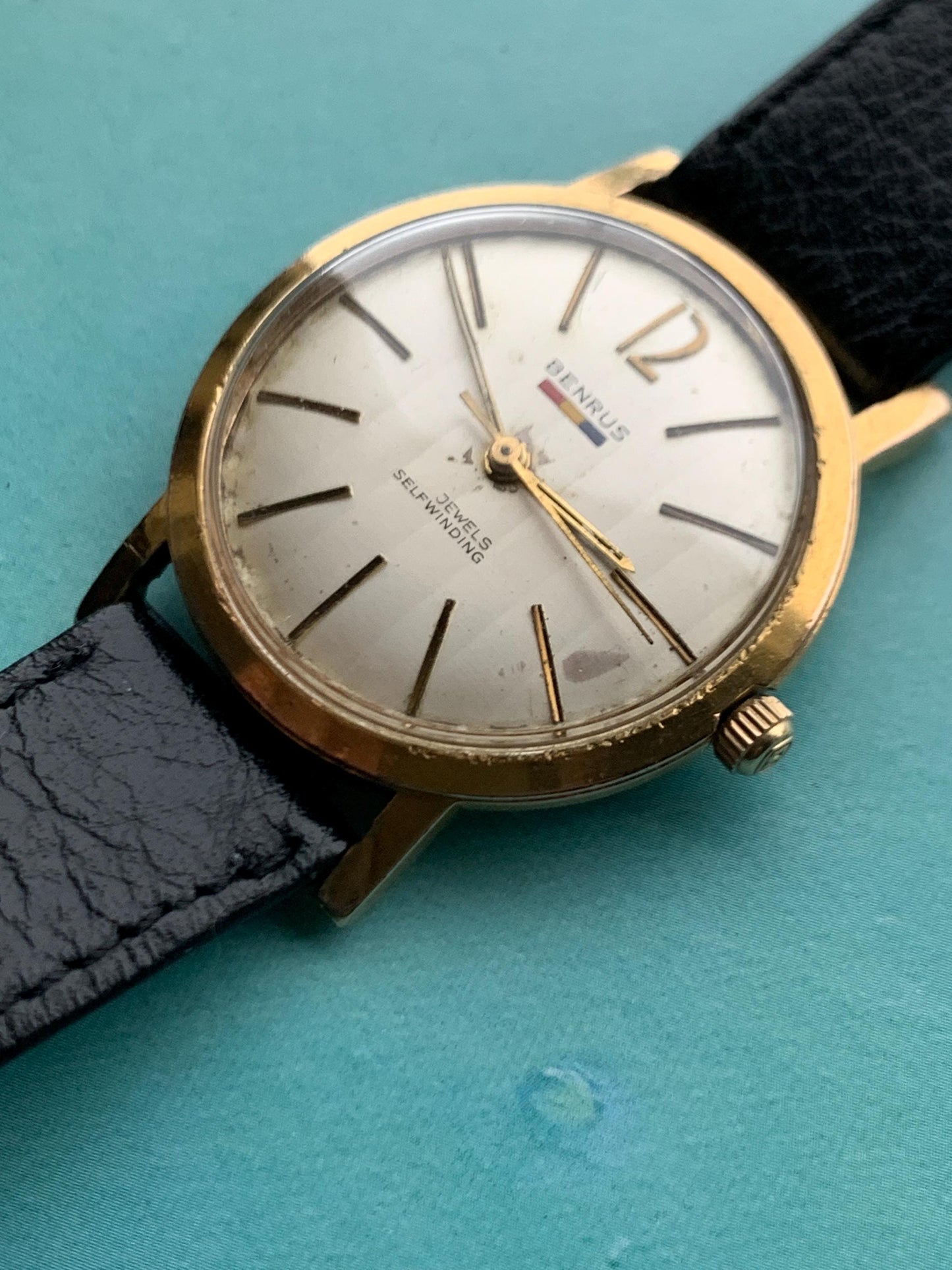 Late 1950s Benrus 7001 Citation Automatic. 10K Gold Plated in good working condition. Stick Indices Ribbed Dial. Self-winder w/vintage strap