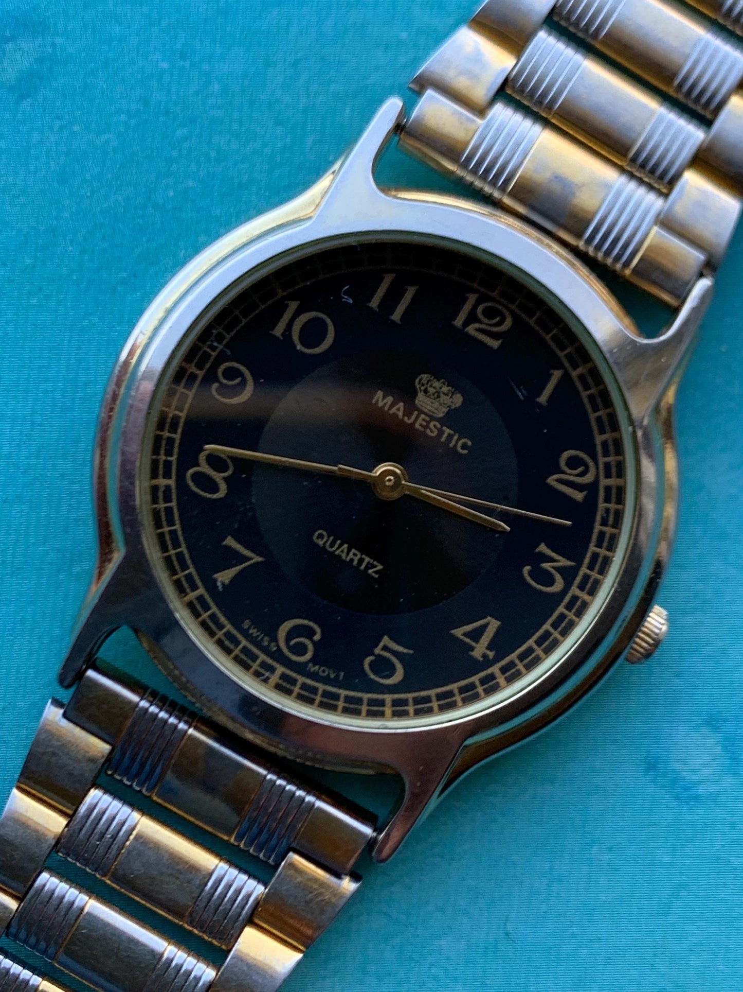 Classic Appearance Black Dial Majestic Watch. 32mm Good used condition. Quartz, New Battery, Two-Tone case and Bracelet. Dial Two-Tone Black