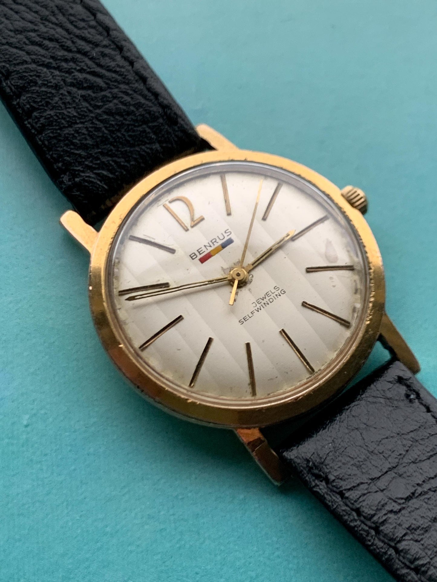 Late 1950s Benrus 7001 Citation Automatic. 10K Gold Plated in good working condition. Stick Indices Ribbed Dial. Self-winder w/vintage strap