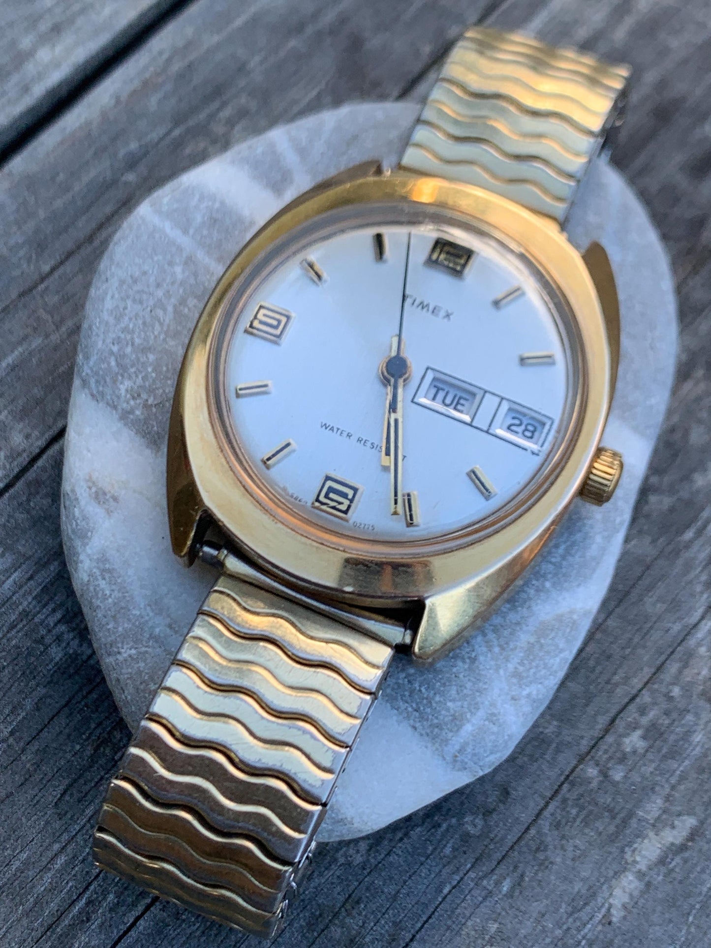 1975 Timex Marlin Winder Watch, Goldtone Case w/Champagne Calendar Dial. Decent Overall Condition with Period Expanding Band. Works!