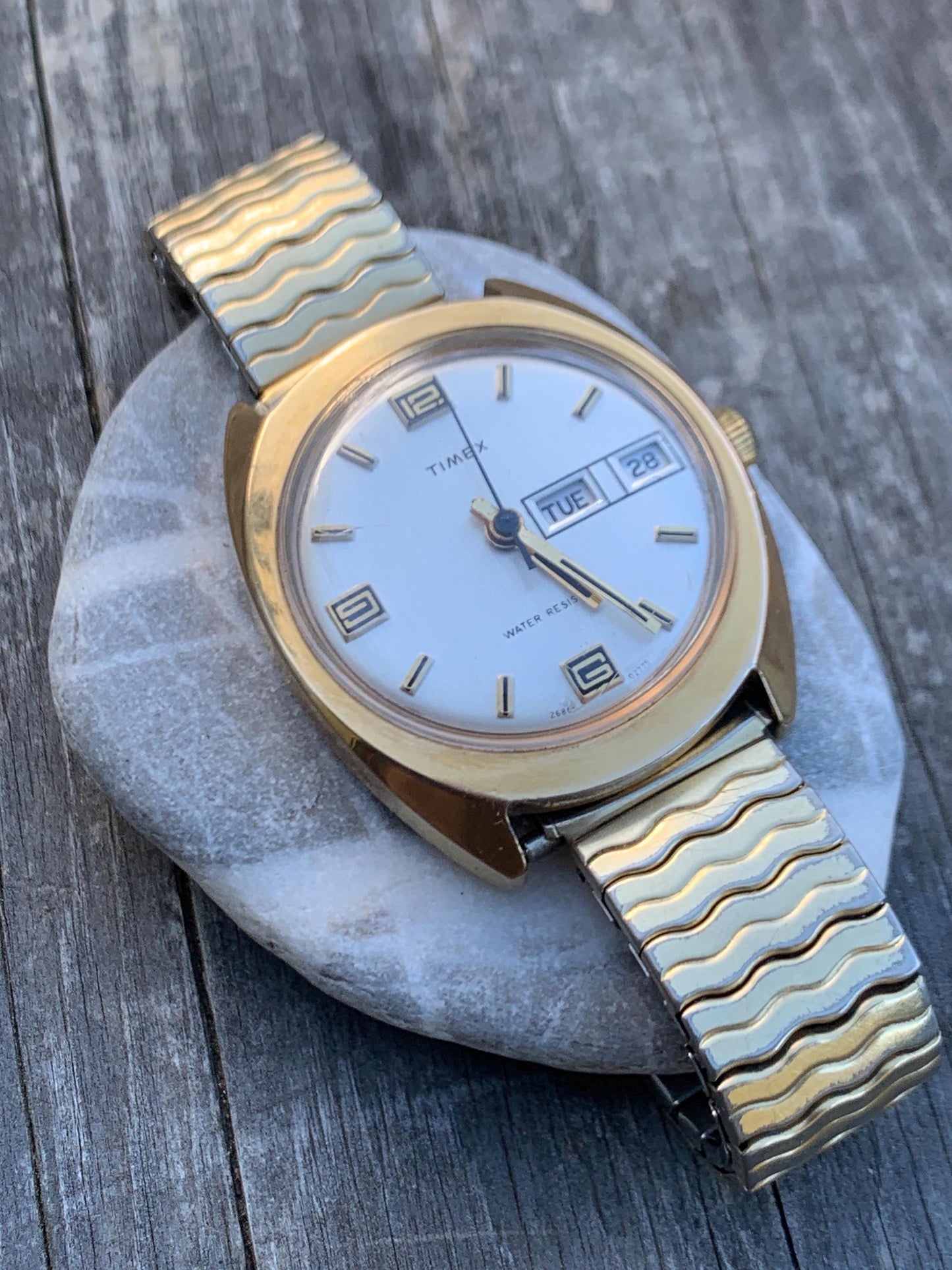 1975 Timex Marlin Winder Watch, Goldtone Case w/Champagne Calendar Dial. Decent Overall Condition with Period Expanding Band. Works!