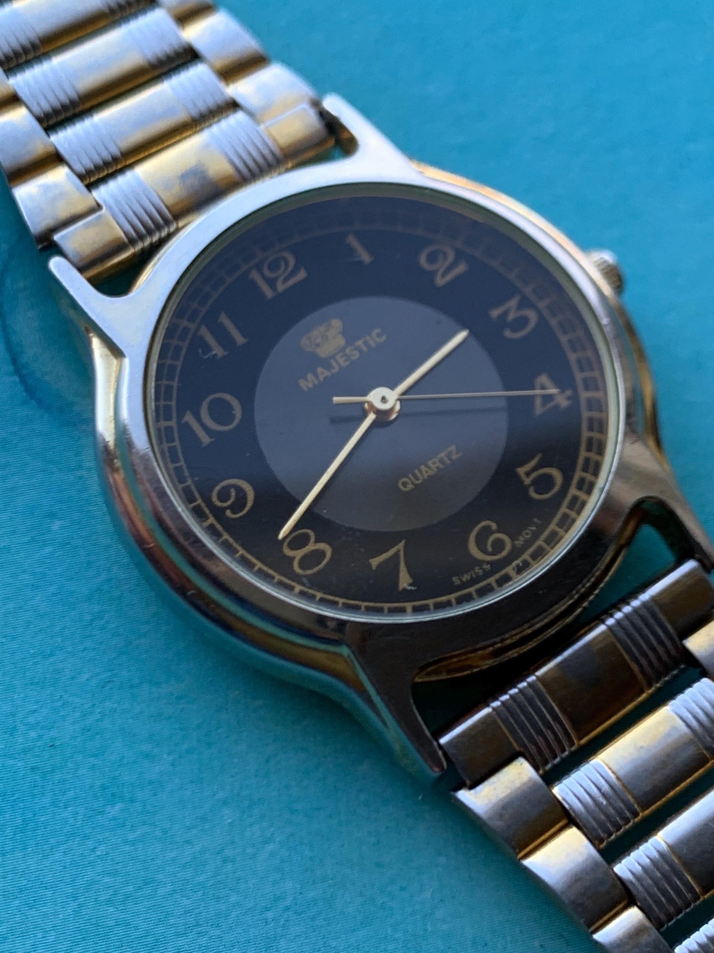 Classic Appearance Black Dial Majestic Watch. 32mm Good used condition. Quartz, New Battery, Two-Tone case and Bracelet. Dial Two-Tone Black