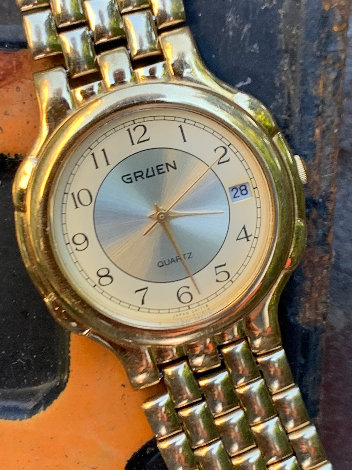 1980s Neo-Vintage Gruen Gold Tone Watch - Champagne Cream Dial with Date - Barely worn, clean, new battery, accurate. Original Integral Band