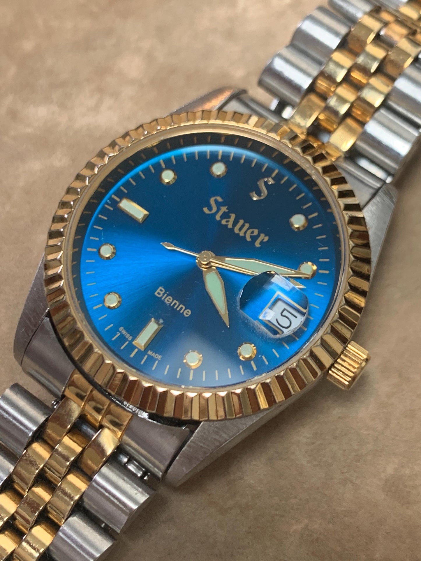 Classic Blue Dial Presidential Stauer Bienne Swiss Made Watch w/Date. Lightly worn, good condition. Quartz, New Battery, Two-Tone Bracelet.