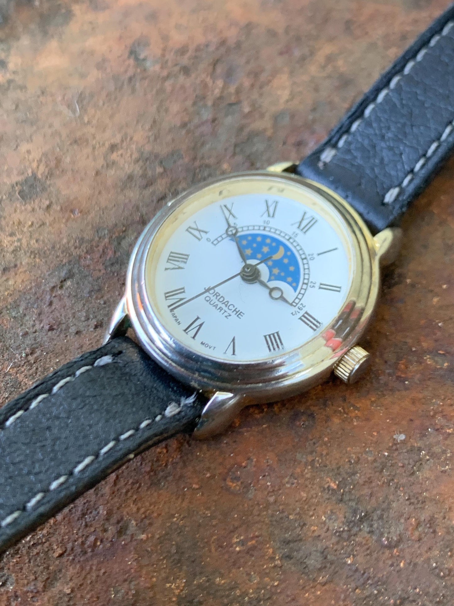 Jordache Moon Motif Watch - Women's FIXED Moon Motif Dial Design:  New battery, vintage leather strap. Roman Dial, Good Condition.