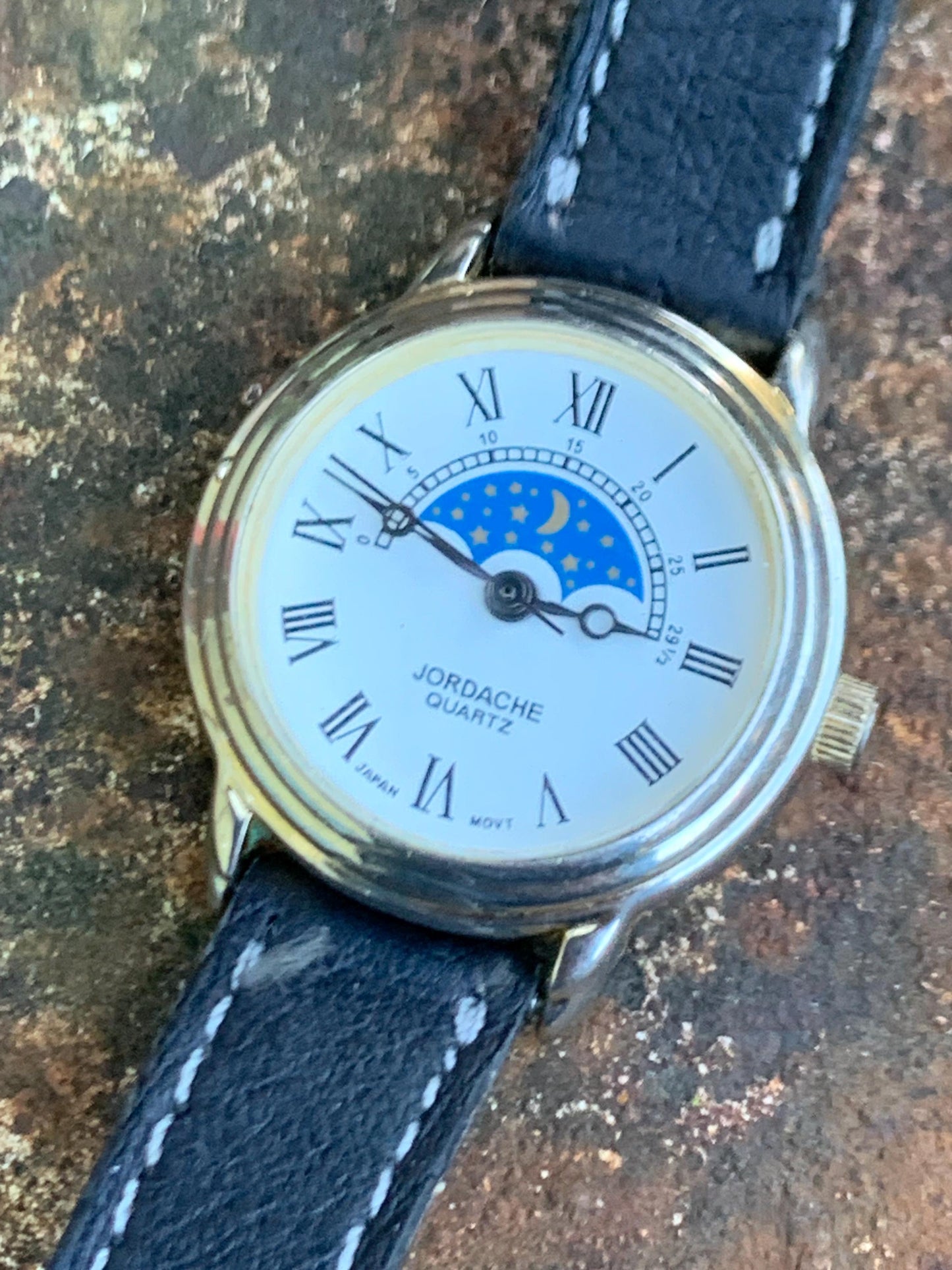 Jordache Moon Motif Watch - Women's FIXED Moon Motif Dial Design:  New battery, vintage leather strap. Roman Dial, Good Condition.