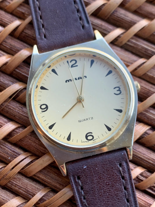 1990s Milan Quartz Watch. Super Shiny Gold tone. Retro Vintage. New Leather Band, Gold Dial. Great Retro Modernist Design, New Battery.