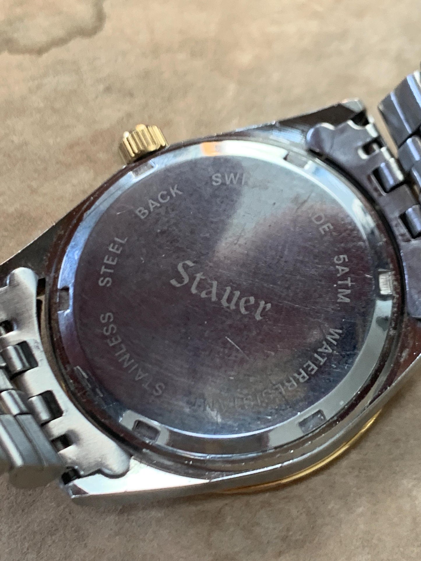 Classic Blue Dial Presidential Stauer Bienne Swiss Made Watch w/Date. Lightly worn, good condition. Quartz, New Battery, Two-Tone Bracelet.