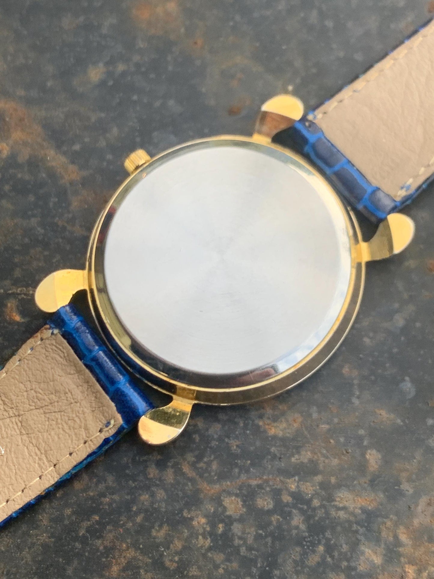 Luminescent Blue 1990s Quartz Watch - 37mm, Gold Indices with Floating Jewels on Ultra Radiant Blue Dial. New battery & NOS blue strap. Fun!