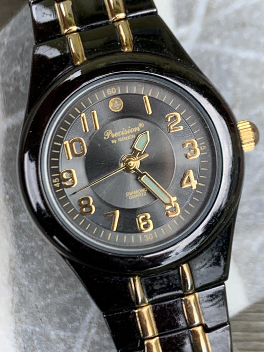 Precision by Gruen Women's Quartz Watch Two Tone Dark Steel and Gold.  Radiant Dial. Barely worn, new battery, runs well. 6.25"