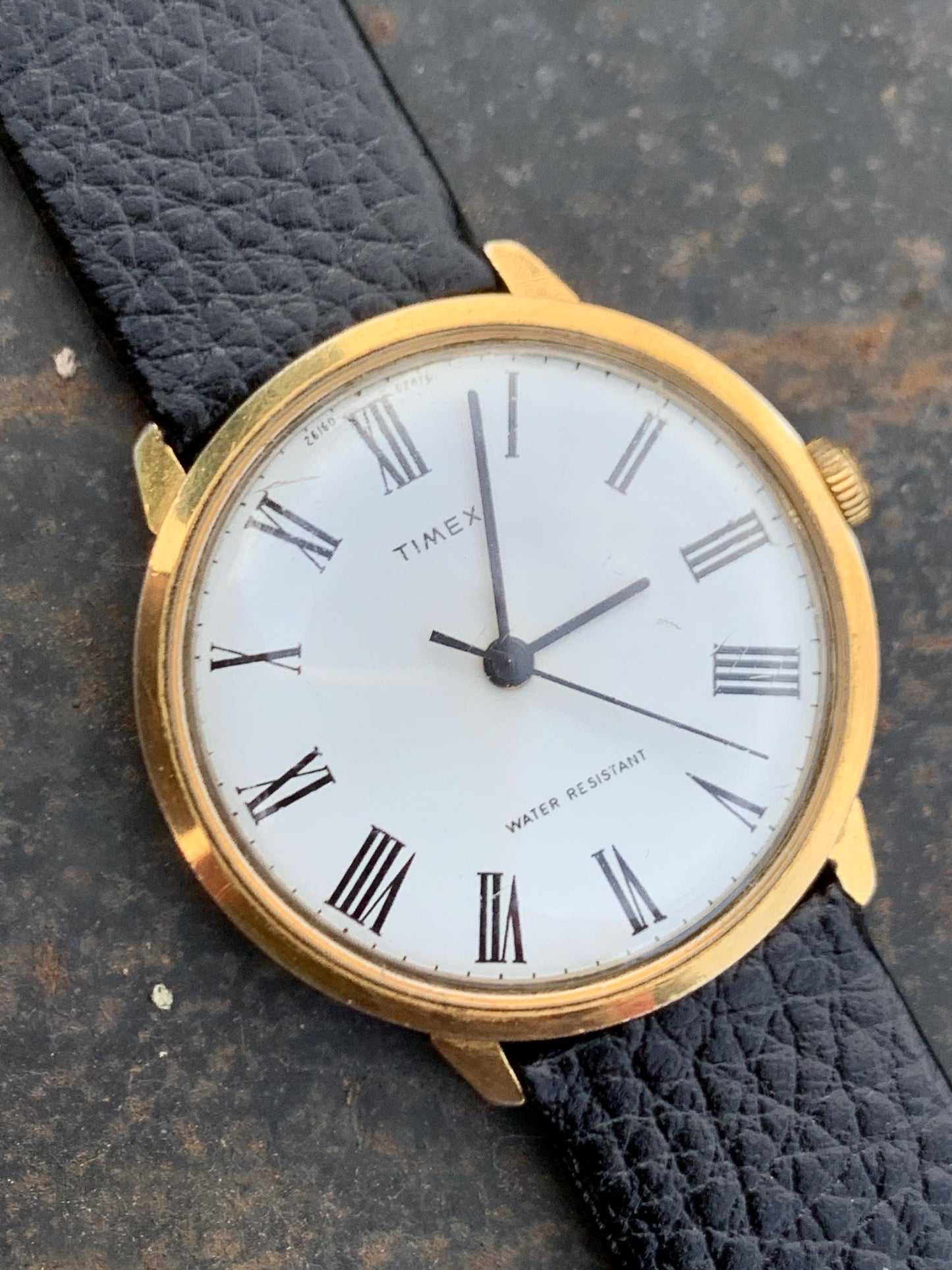 Classic 1976 Timex Marlin Roman Winder Watch. White Dial with Roman Numeral Indices. Good Condition Mechanical Winder, works. New Leather.