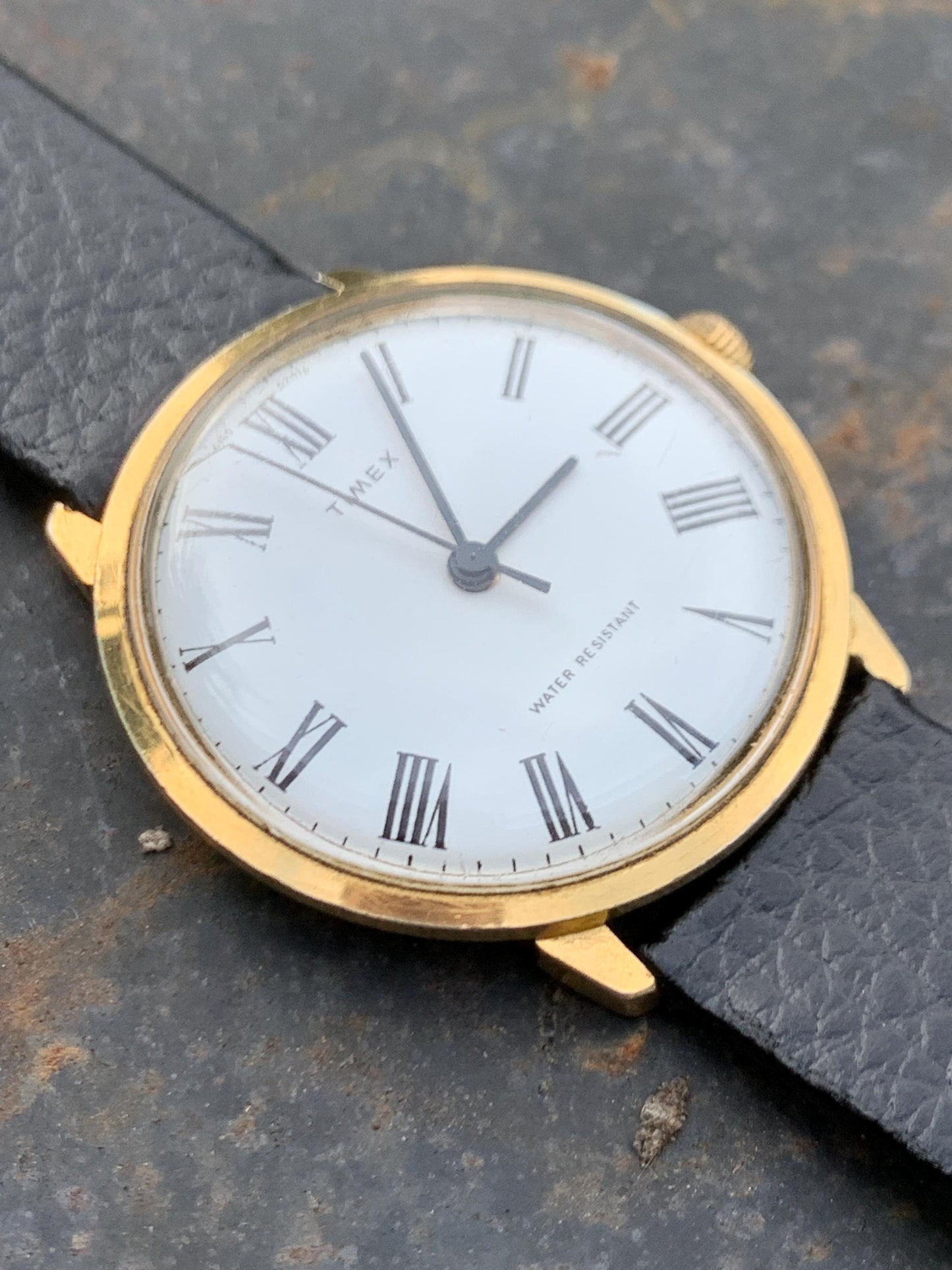 Classic 1976 Timex Marlin Roman Winder Watch. White Dial with Roman Numeral Indices. Good Condition Mechanical Winder, works. New Leather.