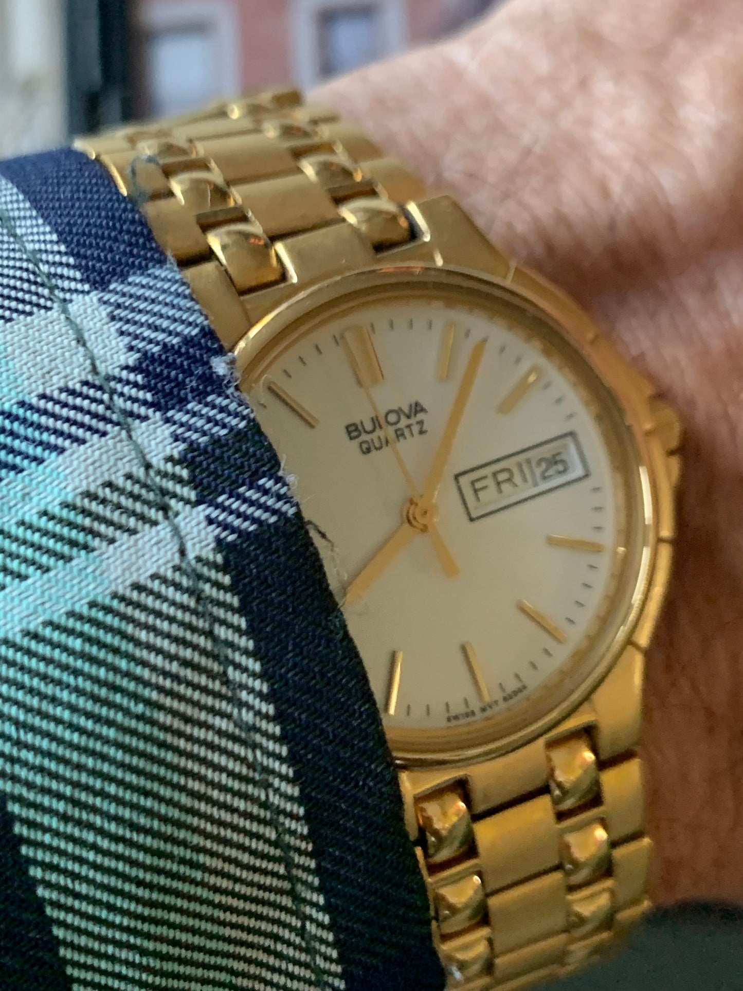 1988 Bulova Quartz Watch Gold Tone Finish, White Dial with Day/Date New battery. Original, integral metal band. Neo Vintage Quartz. Great.