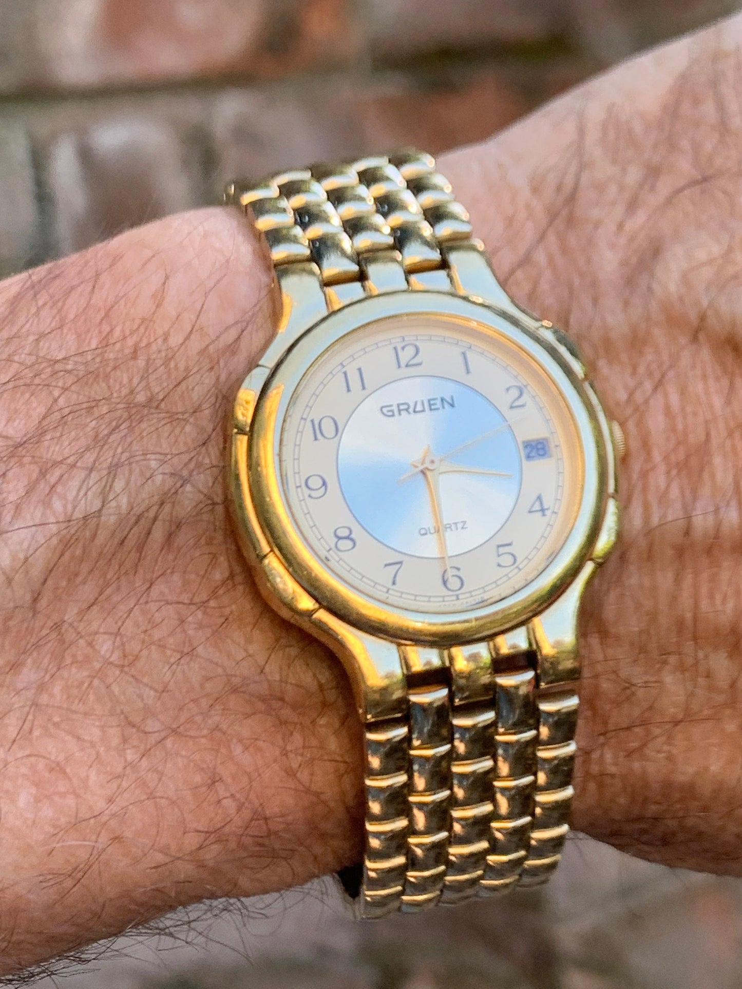 1980s Neo-Vintage Gruen Gold Tone Watch - Champagne Cream Dial with Date - Barely worn, clean, new battery, accurate. Original Integral Band