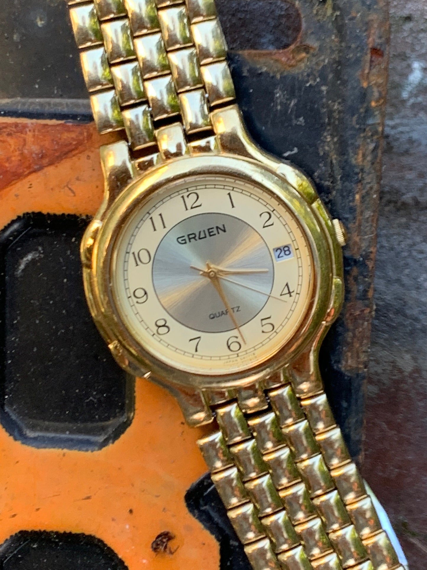 1980s Neo-Vintage Gruen Gold Tone Watch - Champagne Cream Dial with Date - Barely worn, clean, new battery, accurate. Original Integral Band