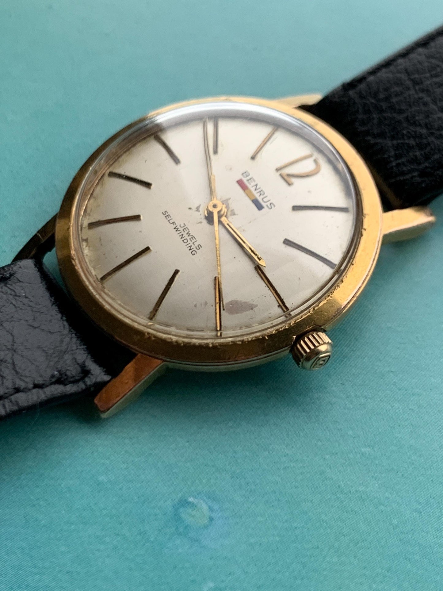 Late 1950s Benrus 7001 Citation Automatic. 10K Gold Plated in good working condition. Stick Indices Ribbed Dial. Self-winder w/vintage strap