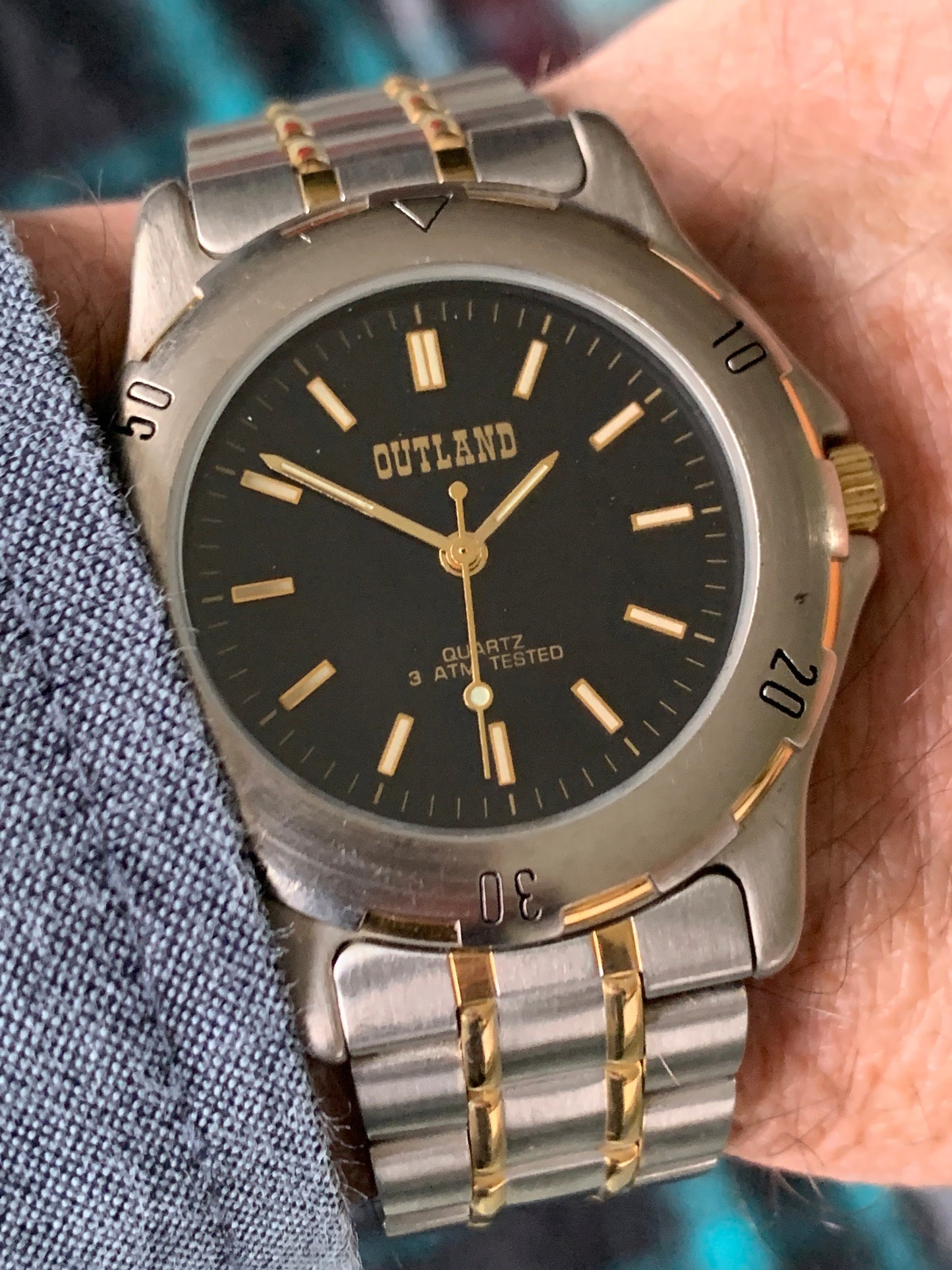 Outland Watch 1990s - Diver Style, Silver tone w/gold tone accents, Black Dial, Good Condition, Good Weight, Works Well. New Battery.