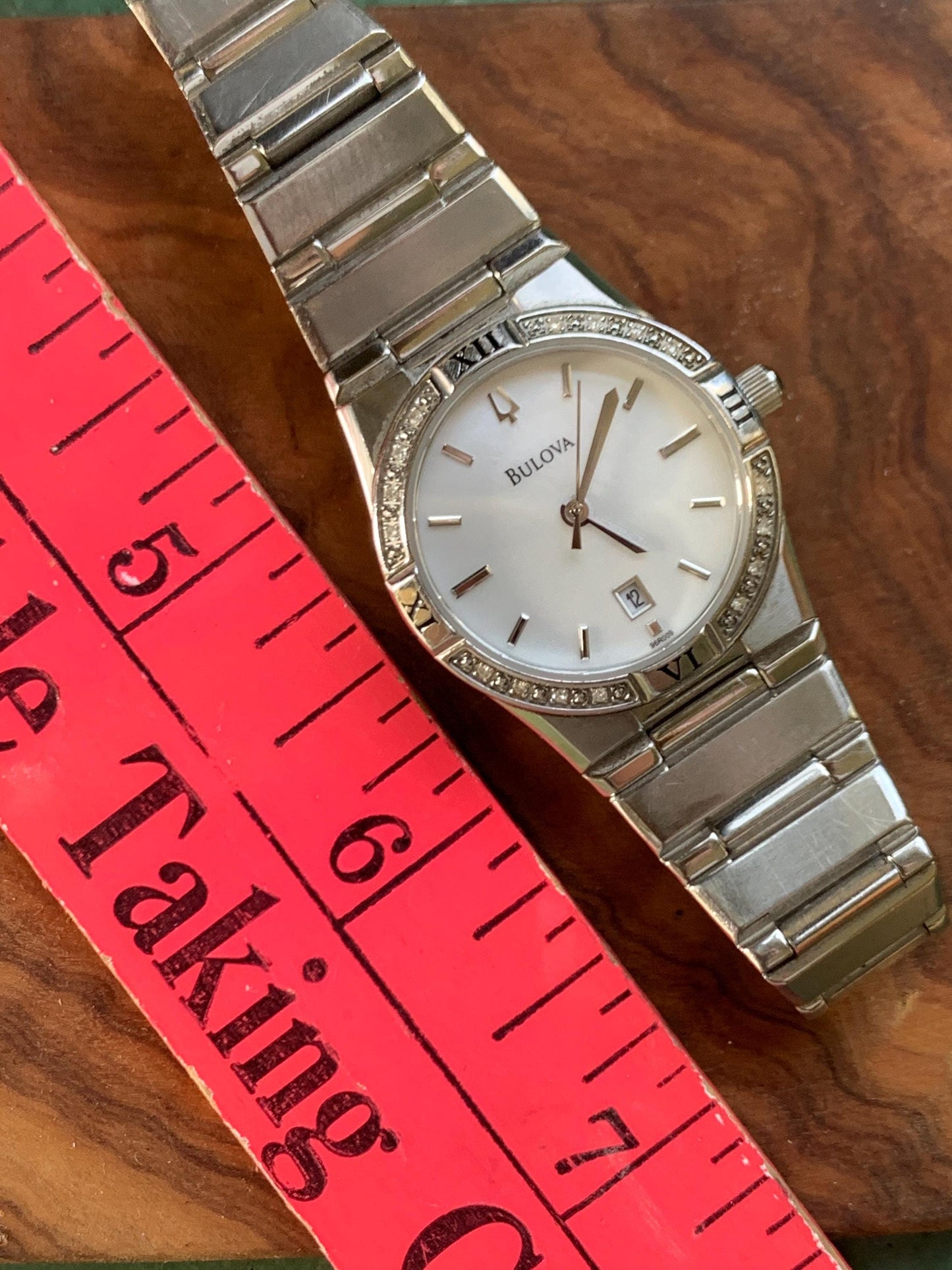 Bulova Ladies Bracelet-Style Roman Steel Watch with Subtle Diamond Bezel - Mother of Pearl Dial with Integral Bracelet. Excellent.