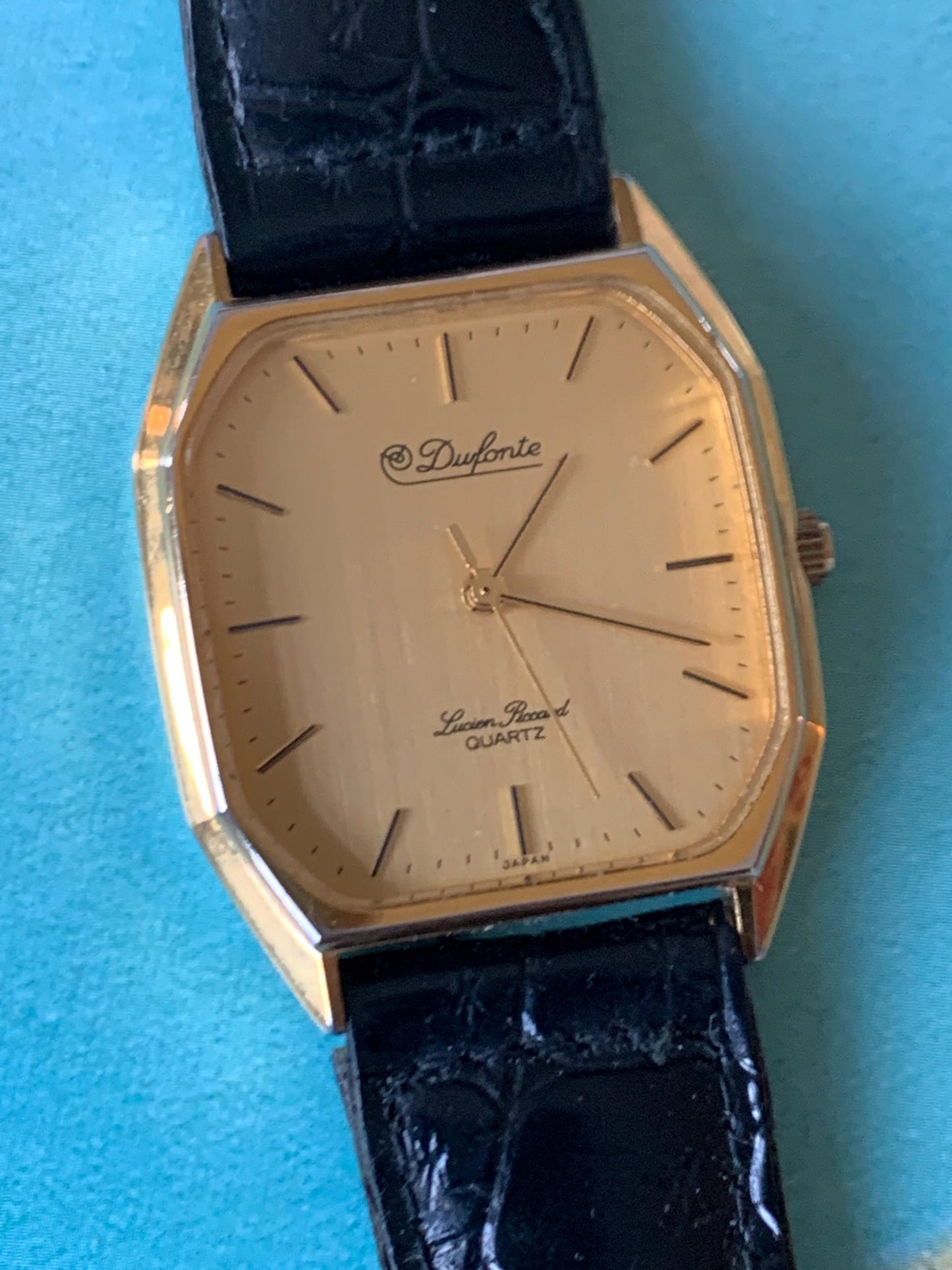 Elegant Dufonte by Lucien Piccard Tank Watch: Goldtone Quartz with Brushed Golden Dial. 1980s/90s Fancy Dress Watch, NOS vintage black strap