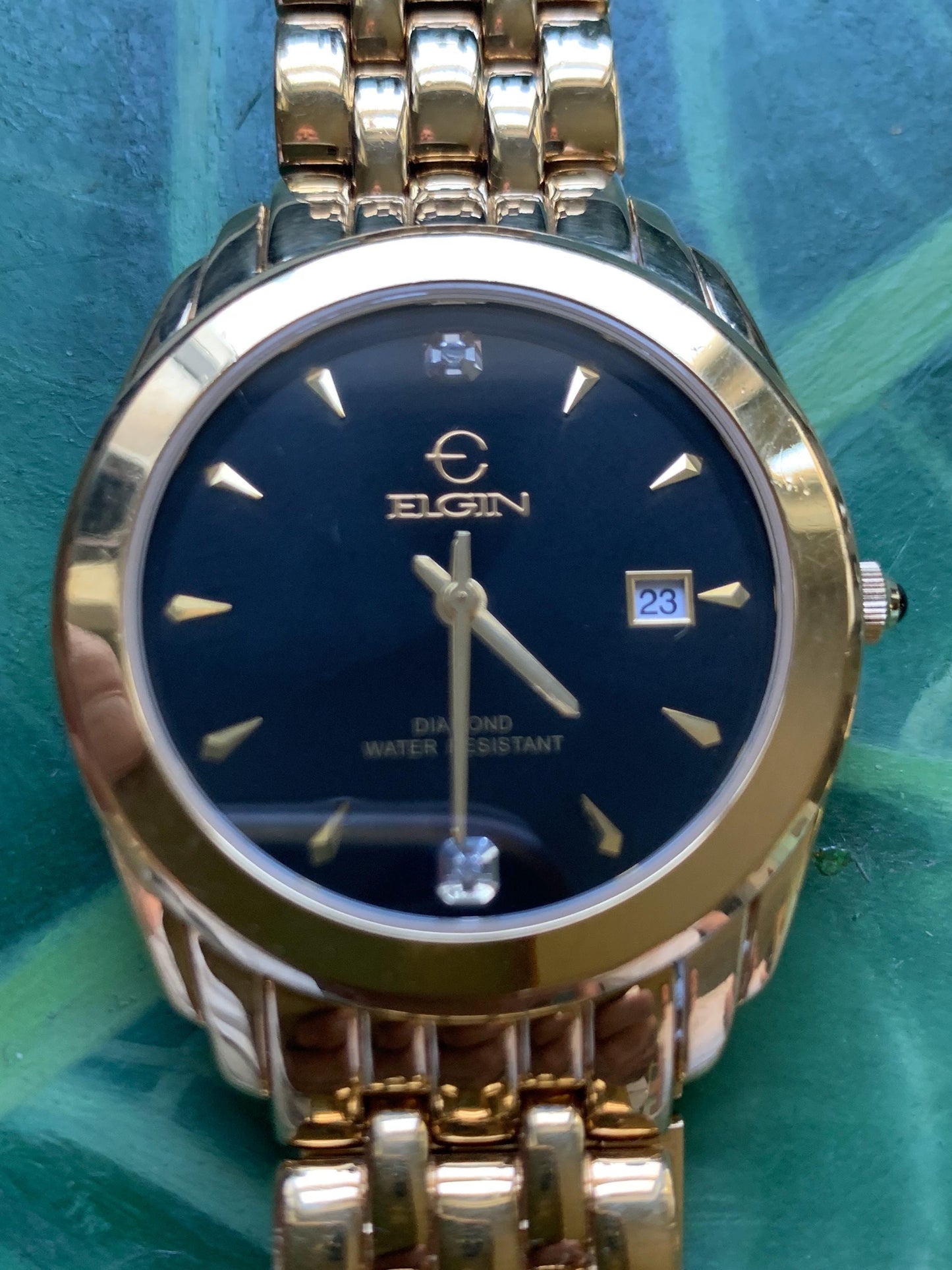 Elegant Elgin Diamond Dial Quartz Watch.  Gold Tone w black dial. Date. Classic 'Fancy' Retro Style. Bracelet. New battery. Great condition.