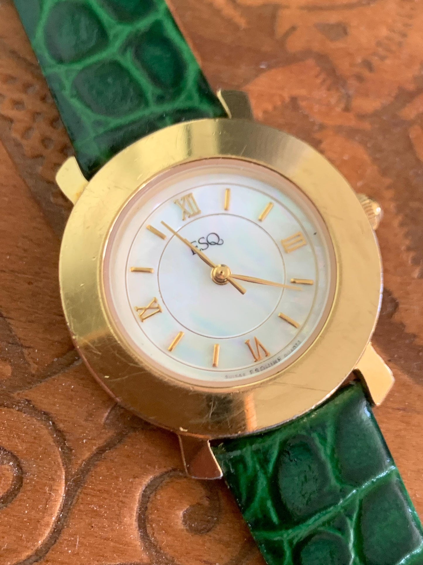 Modernist ESQ (by Movado) Roman Mother of Pearl Dial, Gold Tone Fancy Lugs, 90s, New Crocodile Pattern Green Band. 28mm. Swiss ETA Movement.