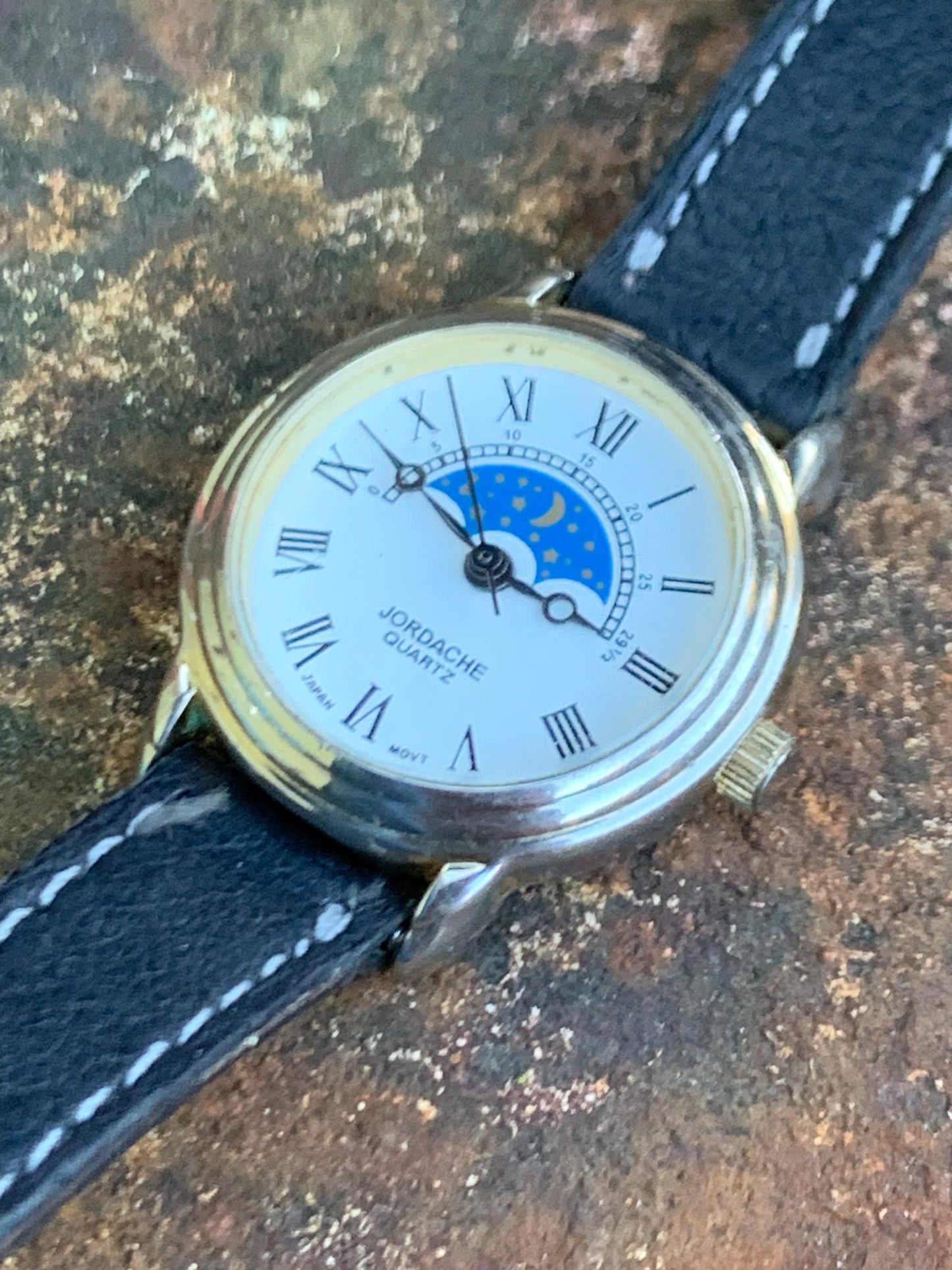 Jordache Moon Motif Watch - Women's FIXED Moon Motif Dial Design:  New battery, vintage leather strap. Roman Dial, Good Condition.