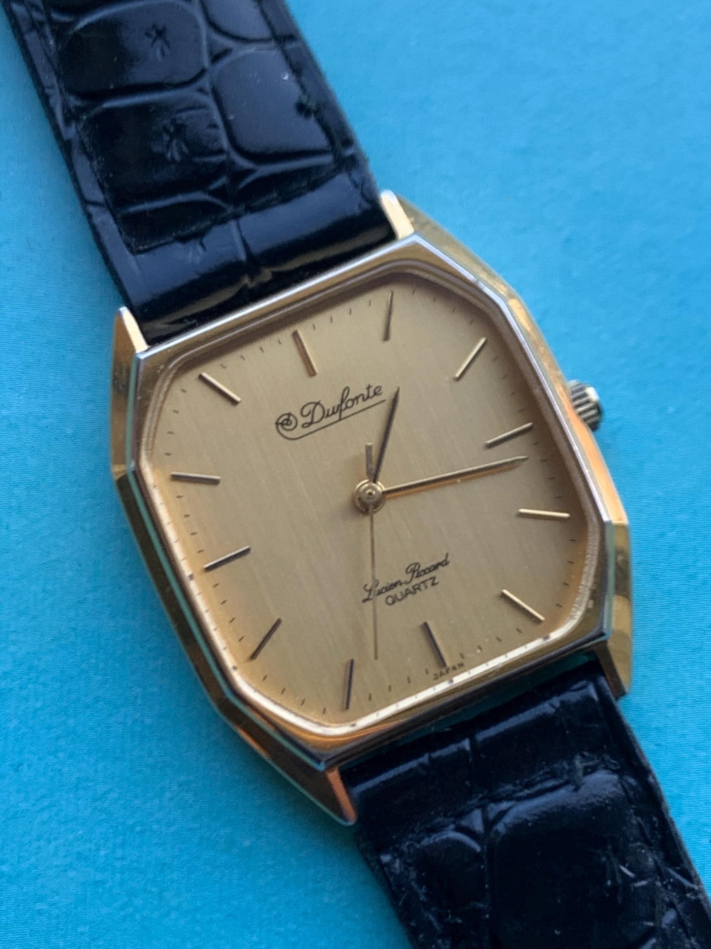 Elegant Dufonte by Lucien Piccard Tank Watch: Goldtone Quartz with Brushed Golden Dial. 1980s/90s Fancy Dress Watch, NOS vintage black strap