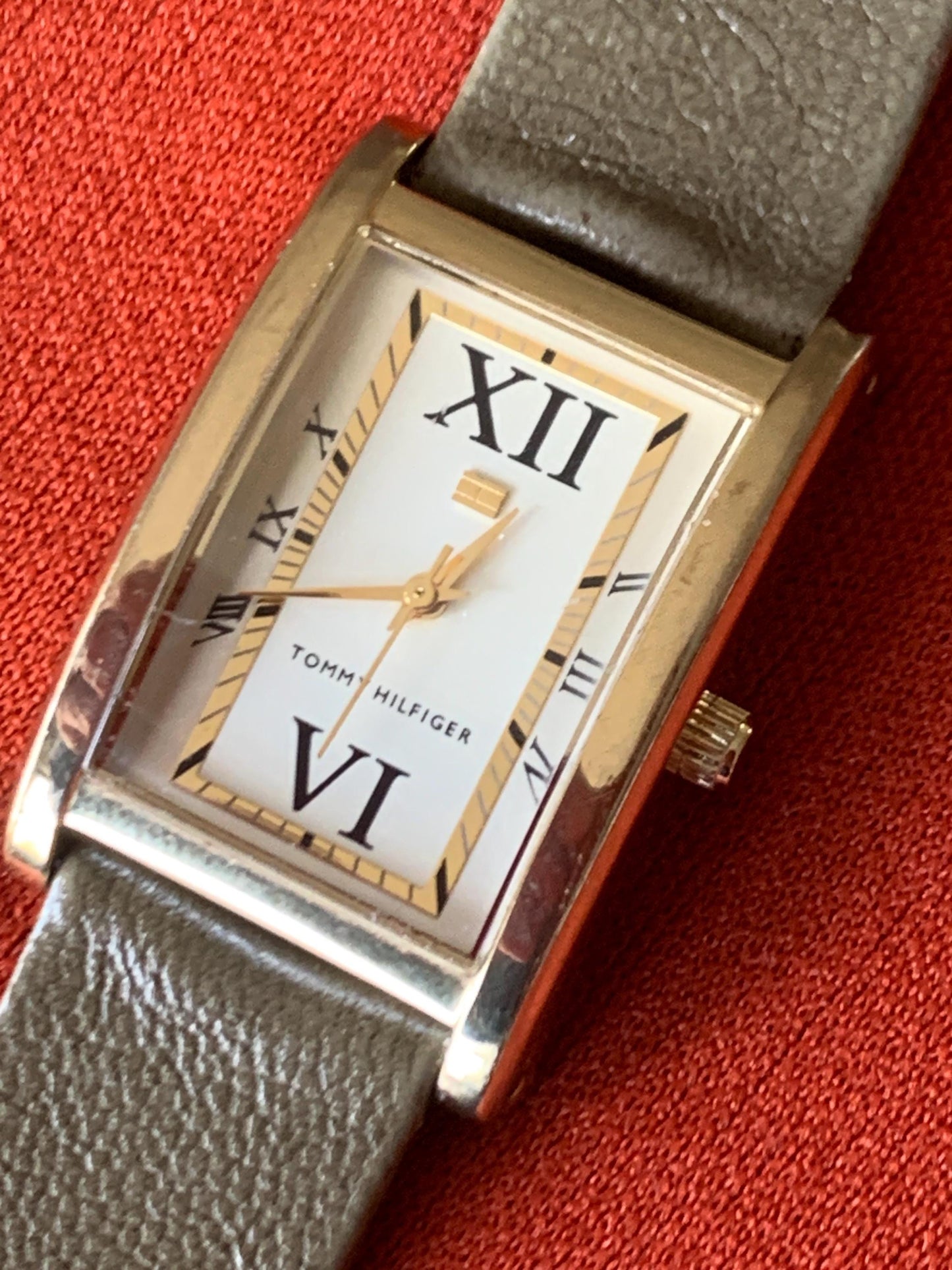 Late 90s Retro-Style Tank Watch: Gold Tone Tommy Hilfiger Tank Watch w/Classic Roman Numerals, Gold Dial. Period  Leather Band, New Battery.