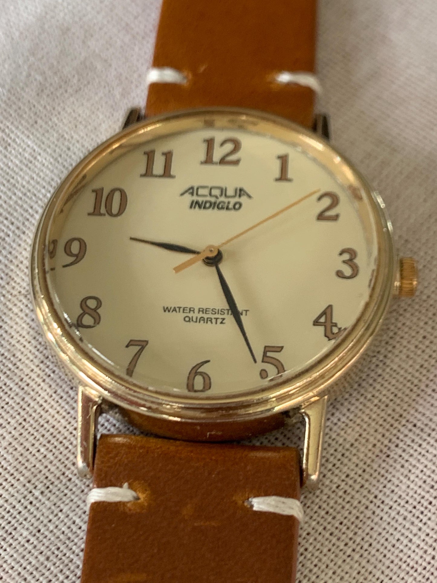 Creamy Retro 34.5mm Acqua by Timex Indiglo Quartz Watch. Goldtone. Y2K Survivor w/New Battery, New Classic Retro Light Brown Leather Strap.