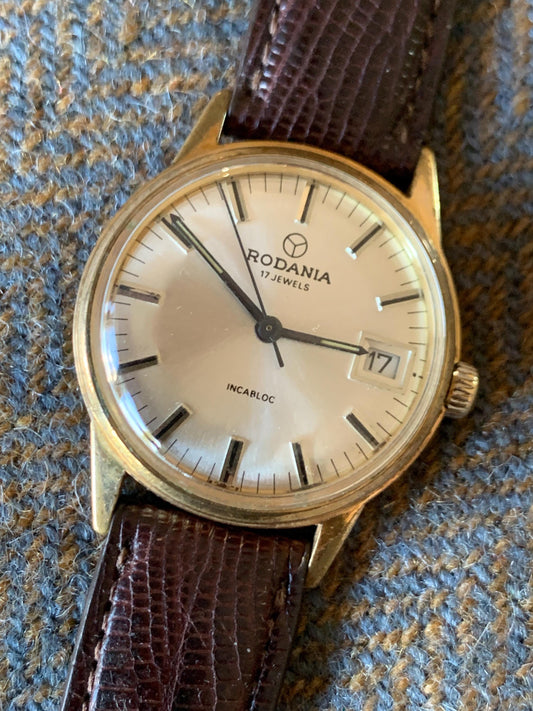 Rodania French/Swiss Made Late 60s Winder with NOS LARGE Hadley Roma Teju Lizard Strap. 33mm 17J Gold Tone w/Radiant Dial. Date. Excellent.
