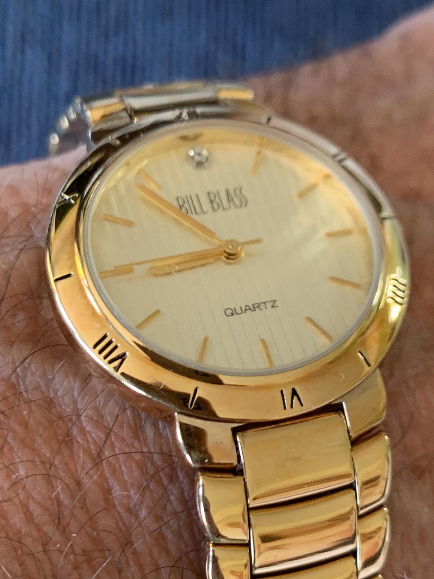 Classic Bill Blass Quartz Watch - Elegant Striped Dial with Roman Bezel, Goldtone, Excellent Condition, Integral Bracelet, Slim, All links.